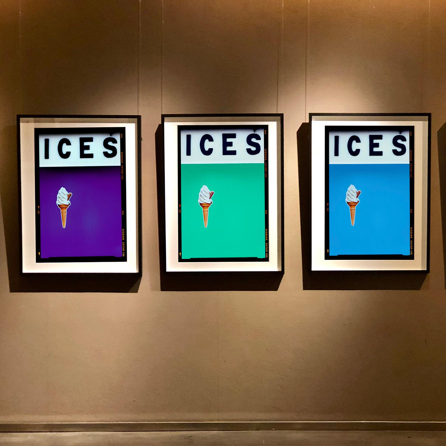 ICES, by Richard Heeps, photographed at the British Seaside at the end of summer 2020. This artwork is about evoking memories of the simple joy of days by the beach. The deep purple color blocking, typography and the surreal twist of the suspended