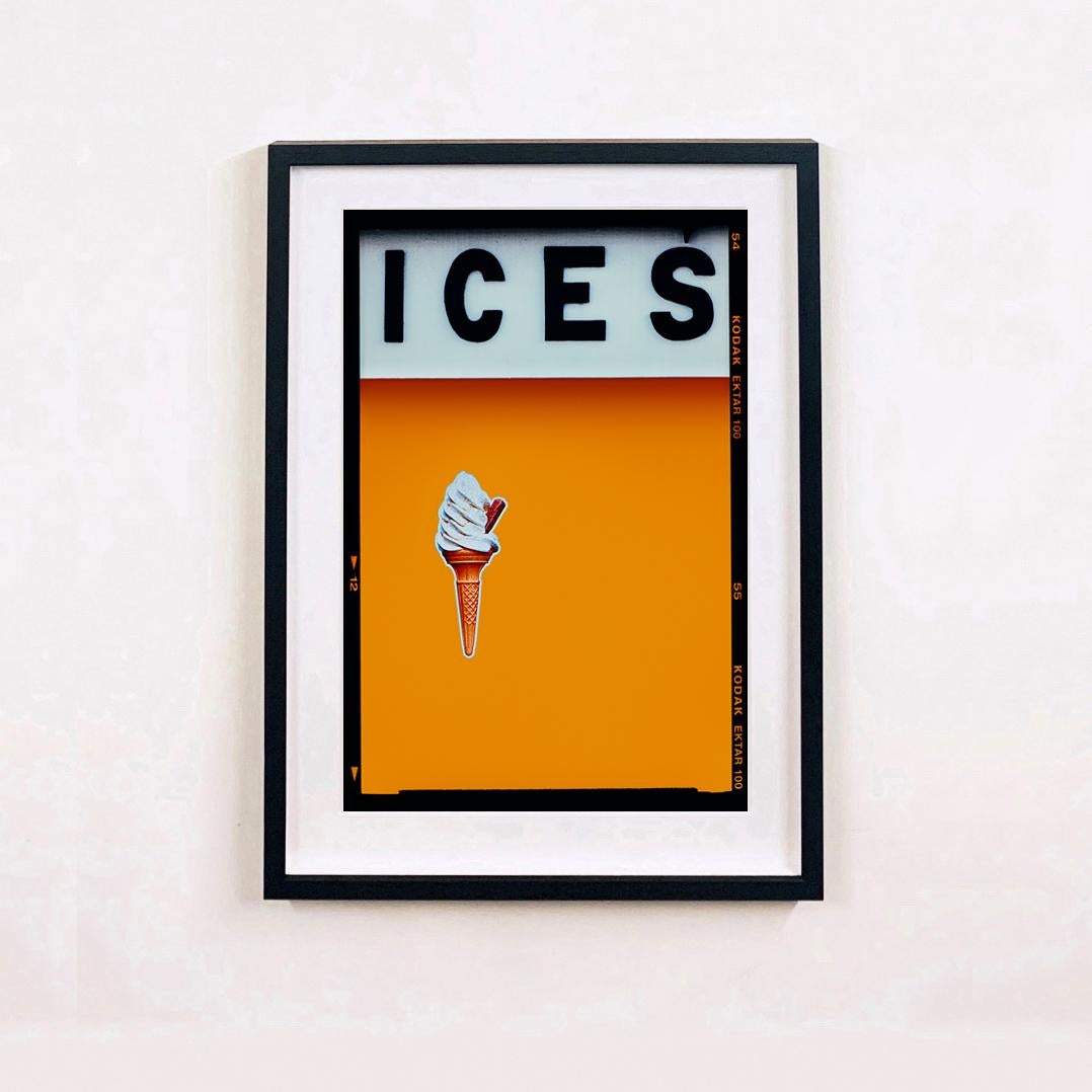 ICES Satsuma Orange, bold pop art street photography from Richard Heeps' series, On-Sea.

Created as an ode to Richard's childhood visits to his grandparents living on the Sussex coast, the artwork tells the story of the simple joys of the British