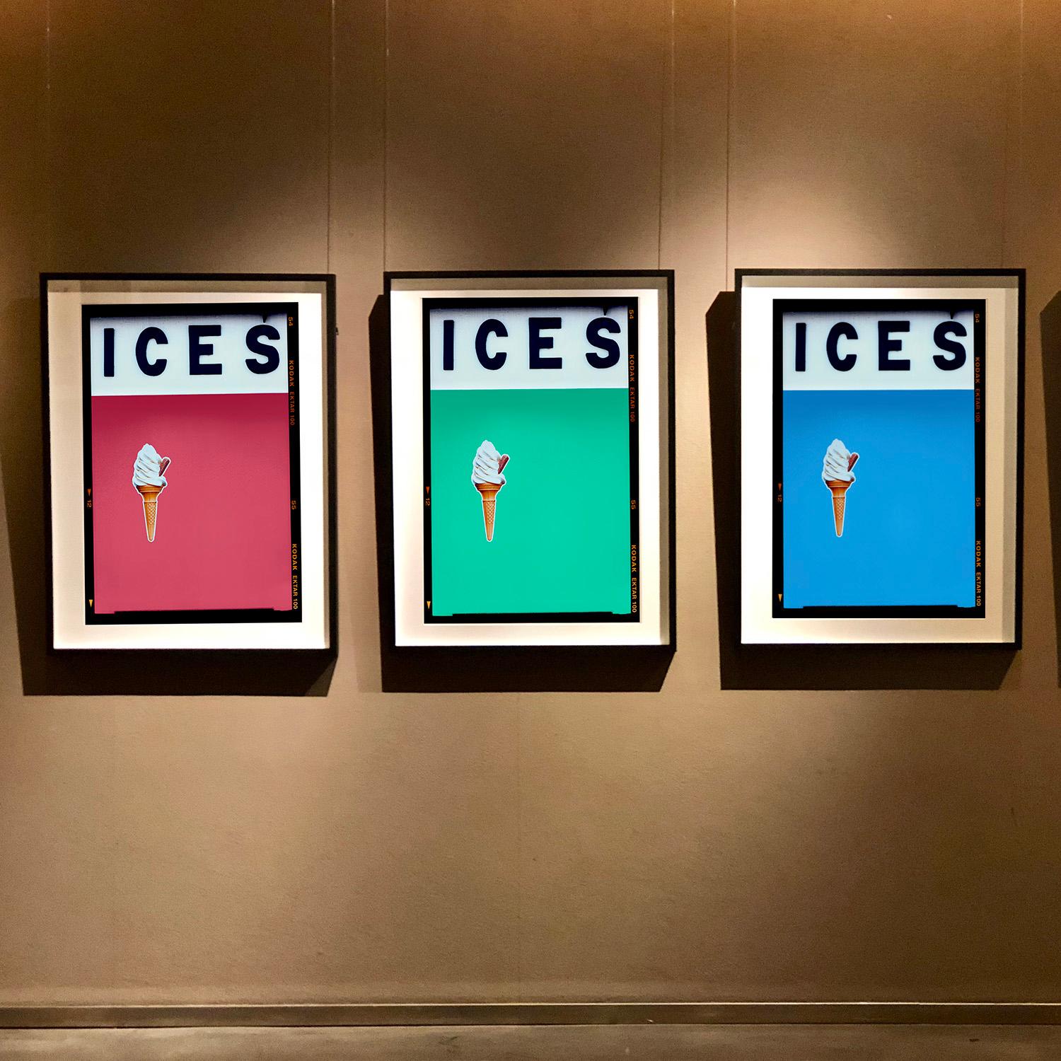 ICES, by Richard Heeps, photographed at the British Seaside at the end of summer 2020. This artwork is about evoking memories of the simple joy of days by the beach. The light blue color blocking, typography and the surreal twist of the suspended