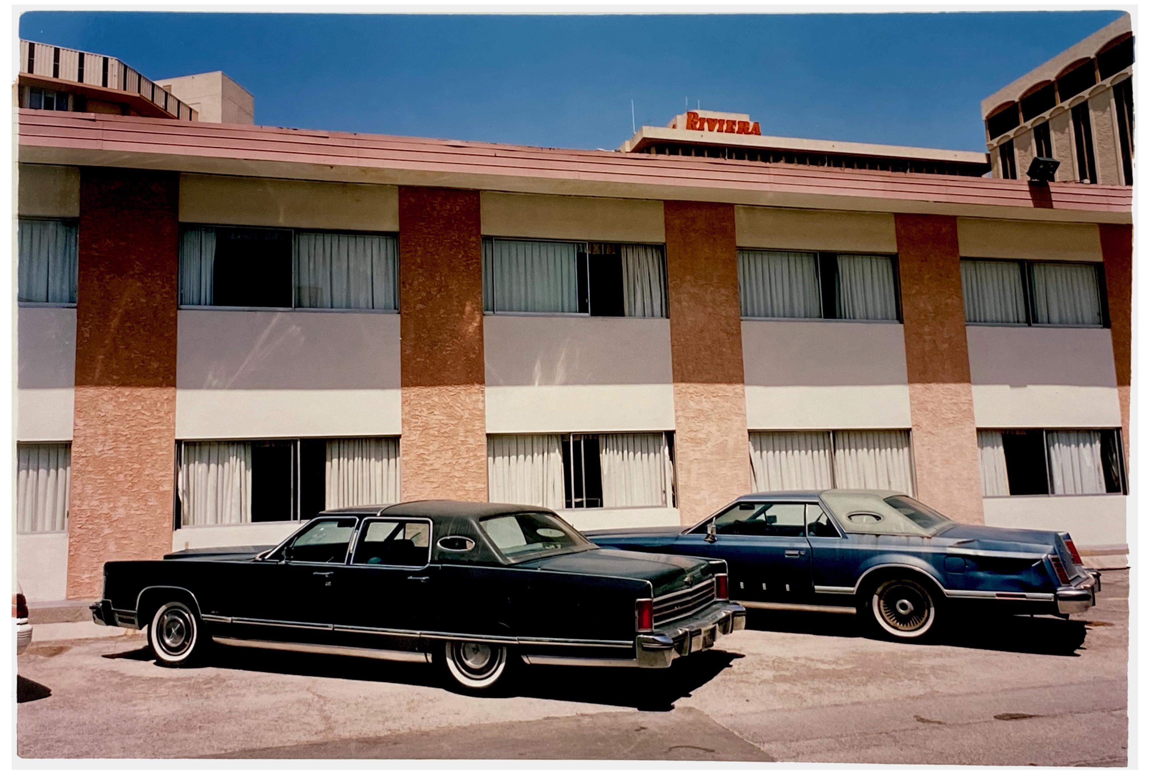 Classic Lincoln cars, parked outside the famous mid-century building, the La Concha Motel in Las Vegas. The cinematic scene of now Lost Vegas, evokes images of gangster movies. Photograph from Richard Heeps Dream in Colour series.

This artwork is a