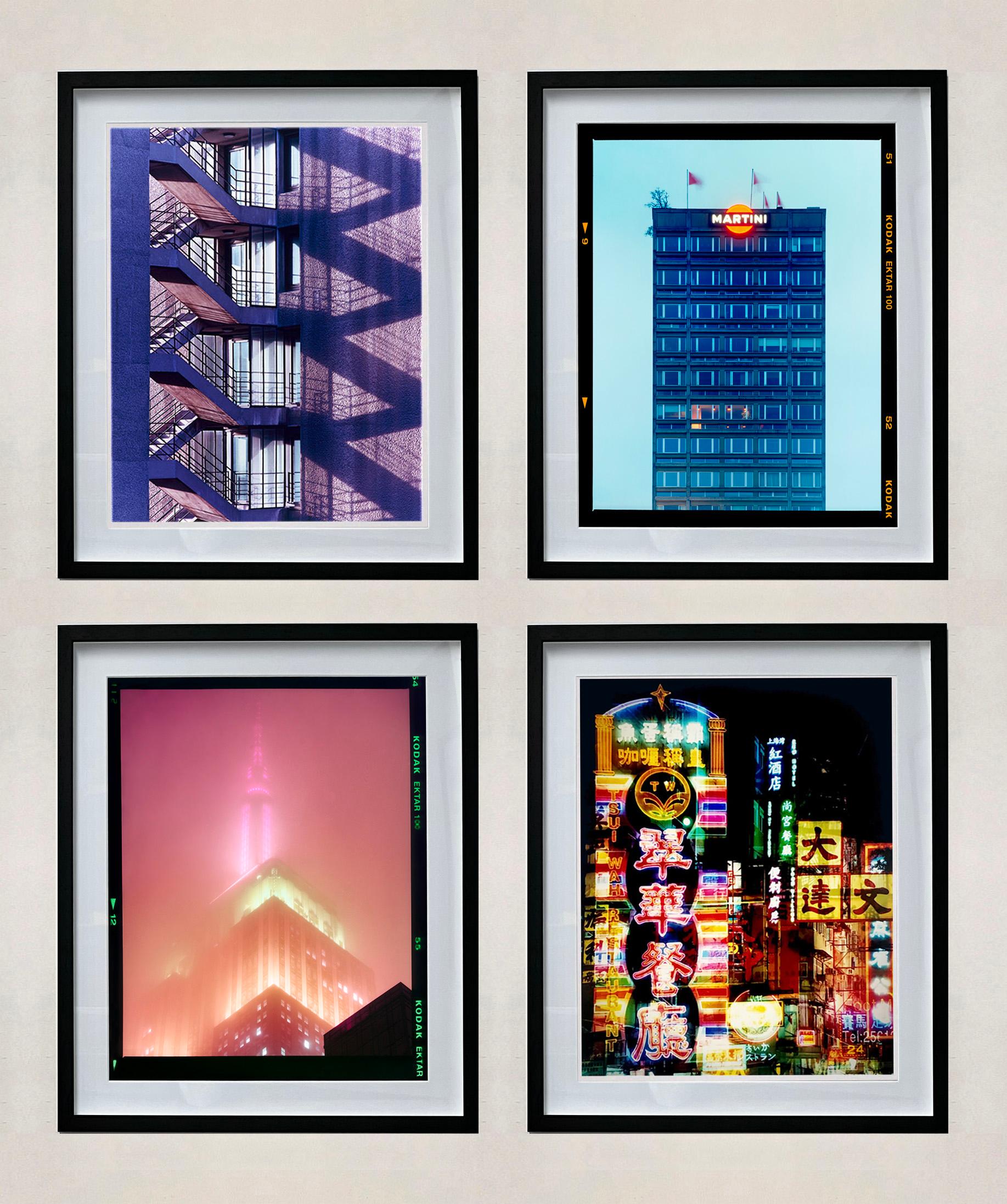 Set of four framed artworks, architecture street photography of the iconic cities London, Milan, New York and Hong Kong. The artworks are typical of Richard Heeps approach to represent the fabric of a place. They are rich in colour and detail,