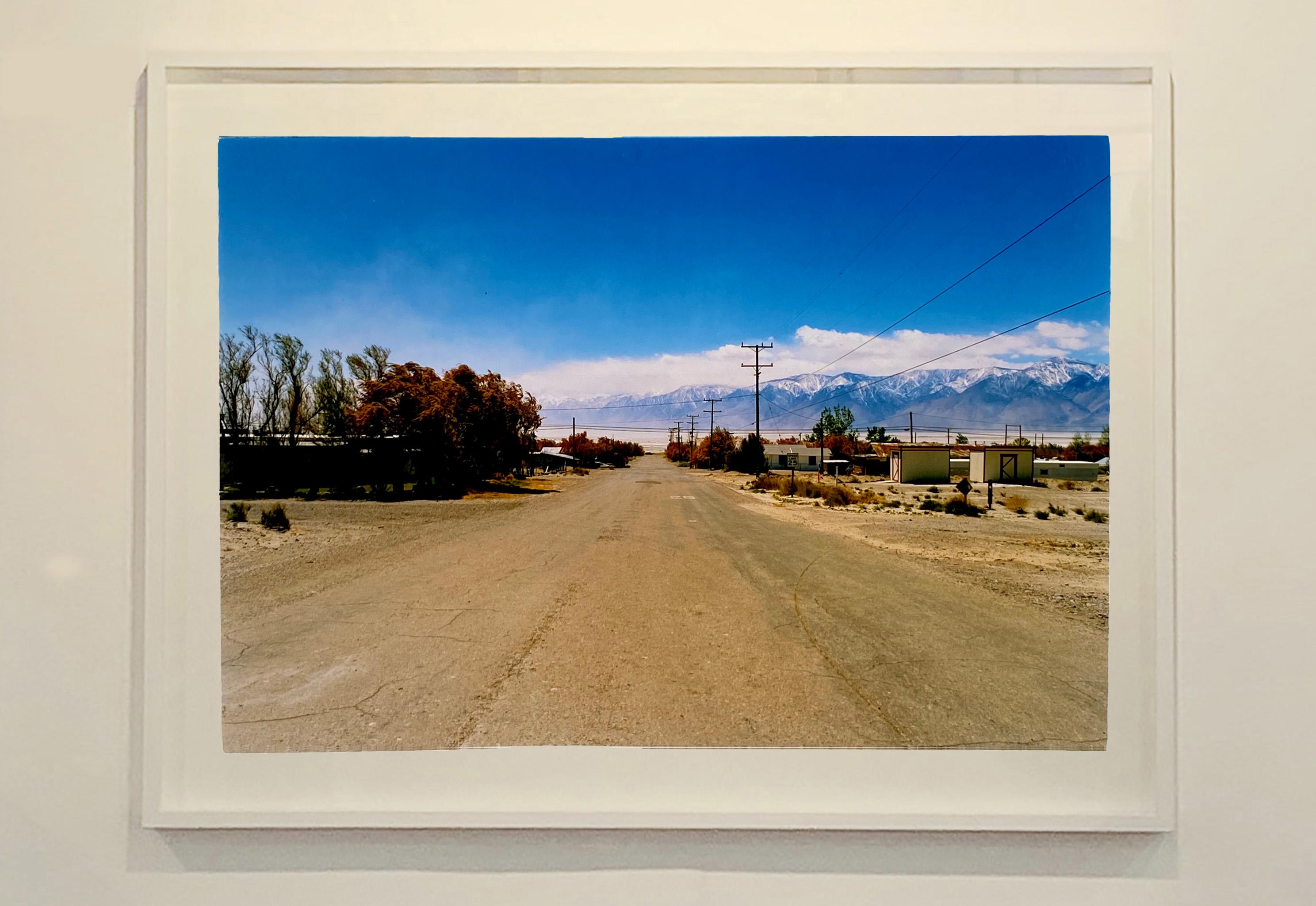 'Malone Street', the American open road leading to snow capped mountains in Keeler, California. This artwork is part of Richard Heeps' 'Dream in Colour' series.

This artwork is a limited edition of 25 gloss photographic print from negative,