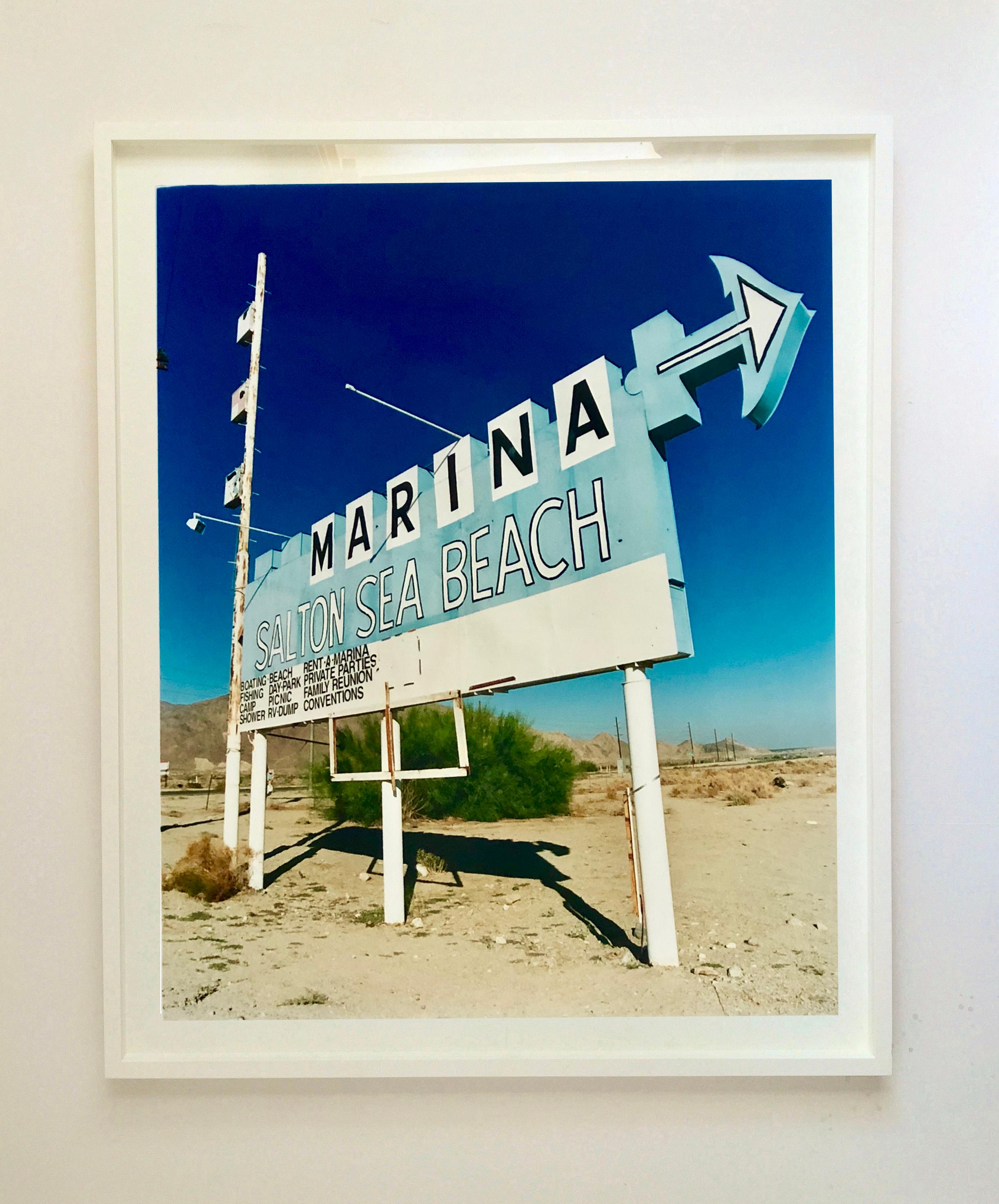 Marina Sign I, Salton Sea Beach, California - Roadside sign color photography - Beige Color Photograph by Richard Heeps