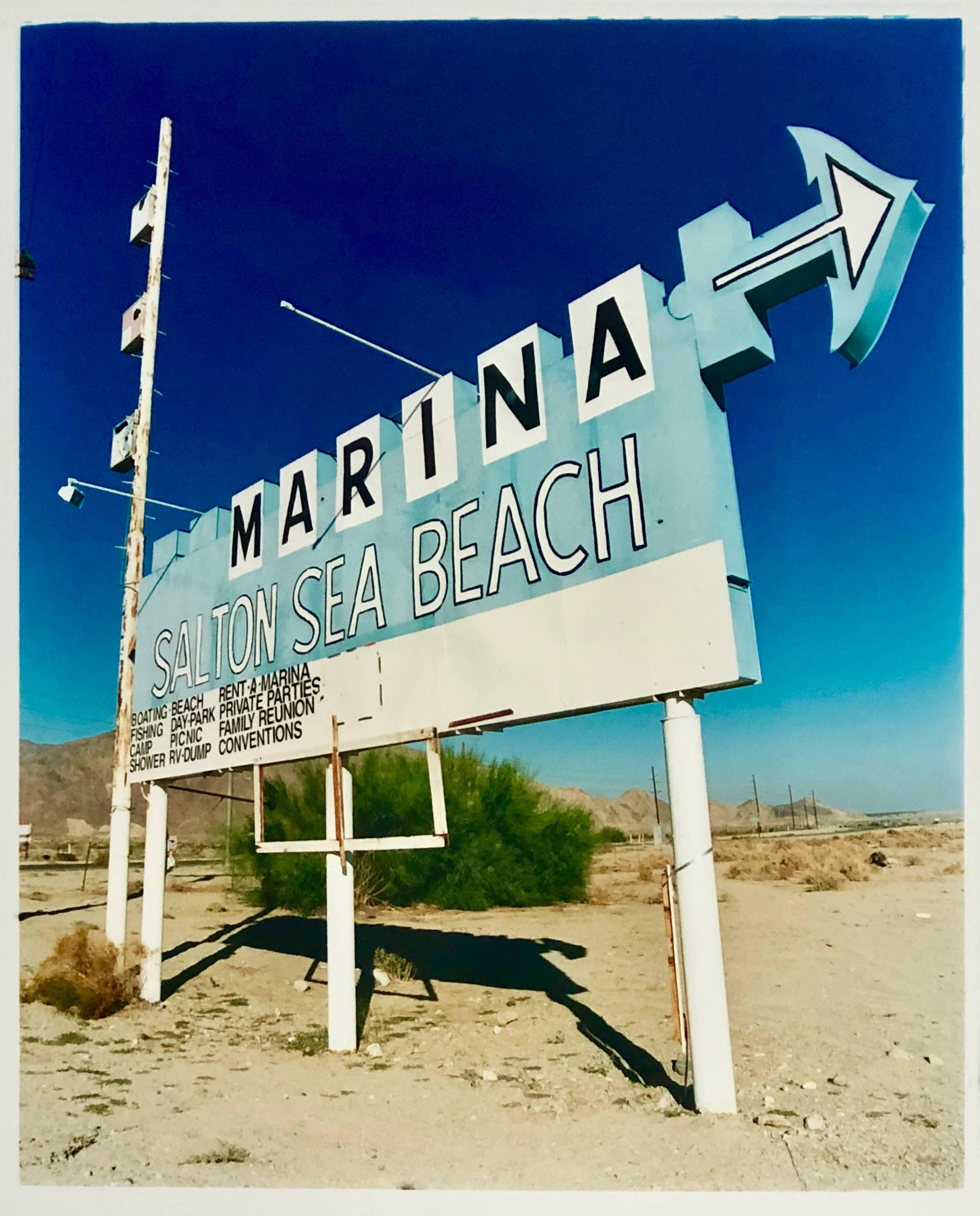 Richard Heeps Landscape Photograph - Marina Sign I, Salton Sea Beach, California - Roadside sign color photography