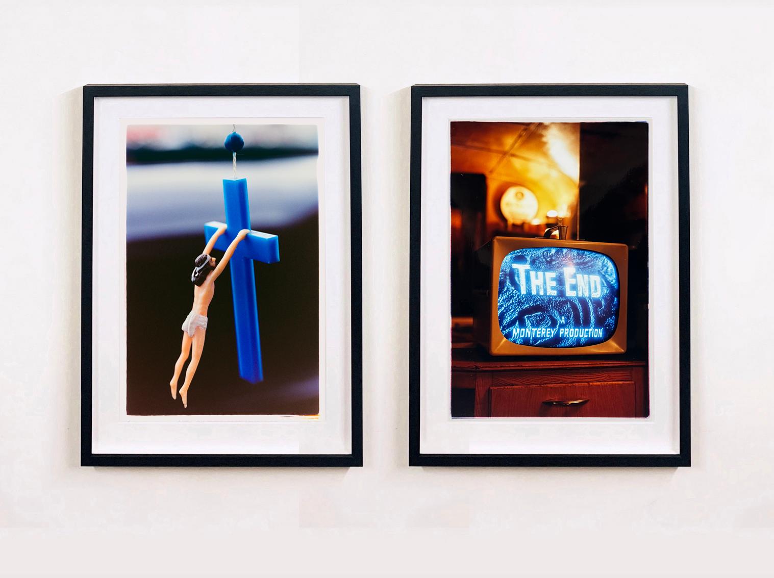 Mascot, photograph from Richard Heeps' series, Man's Ruin. Captured at the Hot Rod Hayride this Jesus on a Cross, was meant to protect the Hot Rodders in their cars. There is something about the light and colours in this picture which give it an