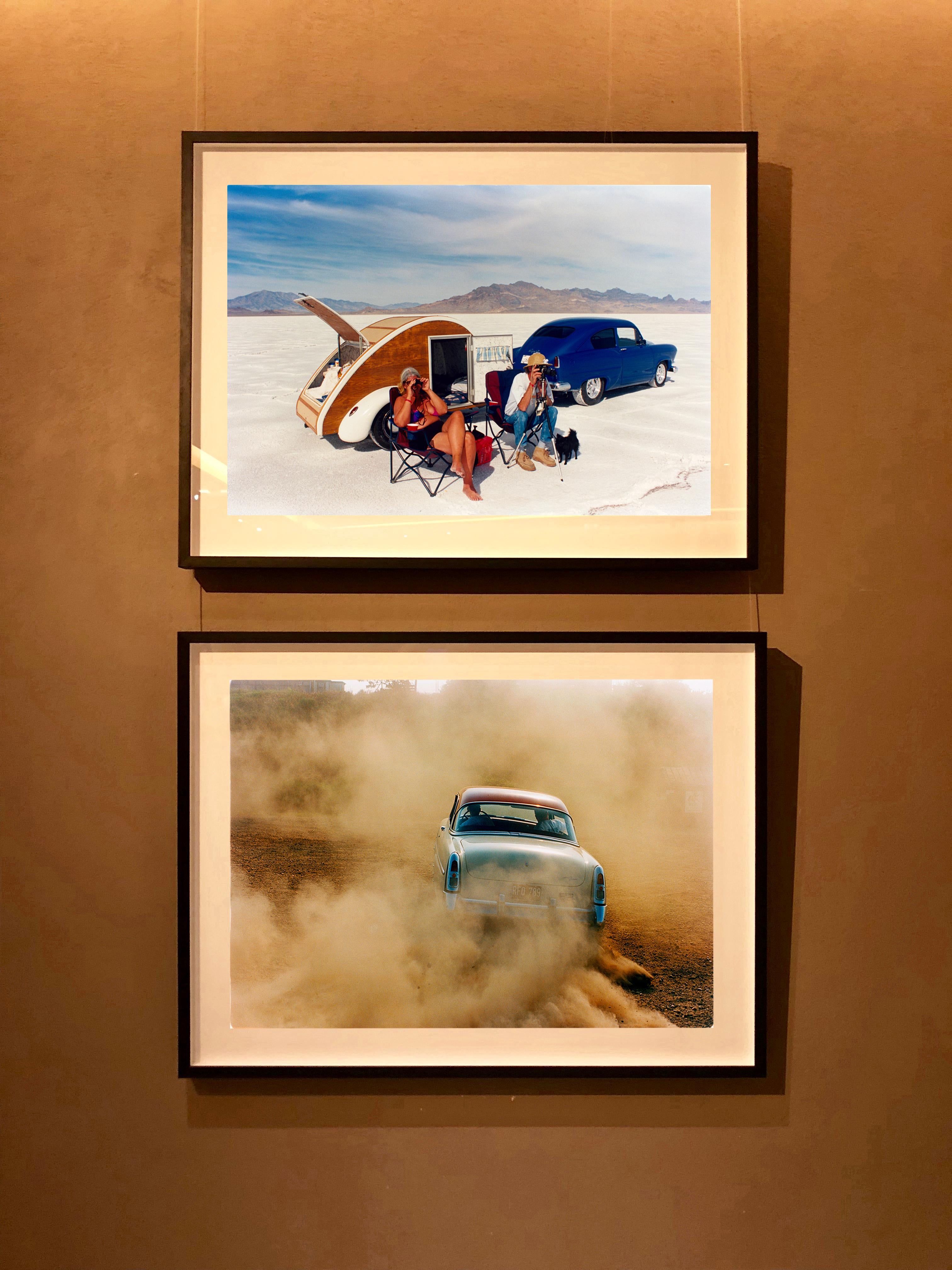'Mercury in the Dust' shows a classic American car donut driving on a Norfolk beach in the East of England. This photograph was captured at Hemsby Rock and Roll weekend, and is part of Richard Heeps' Man's Ruin' series.

This artwork is a limited