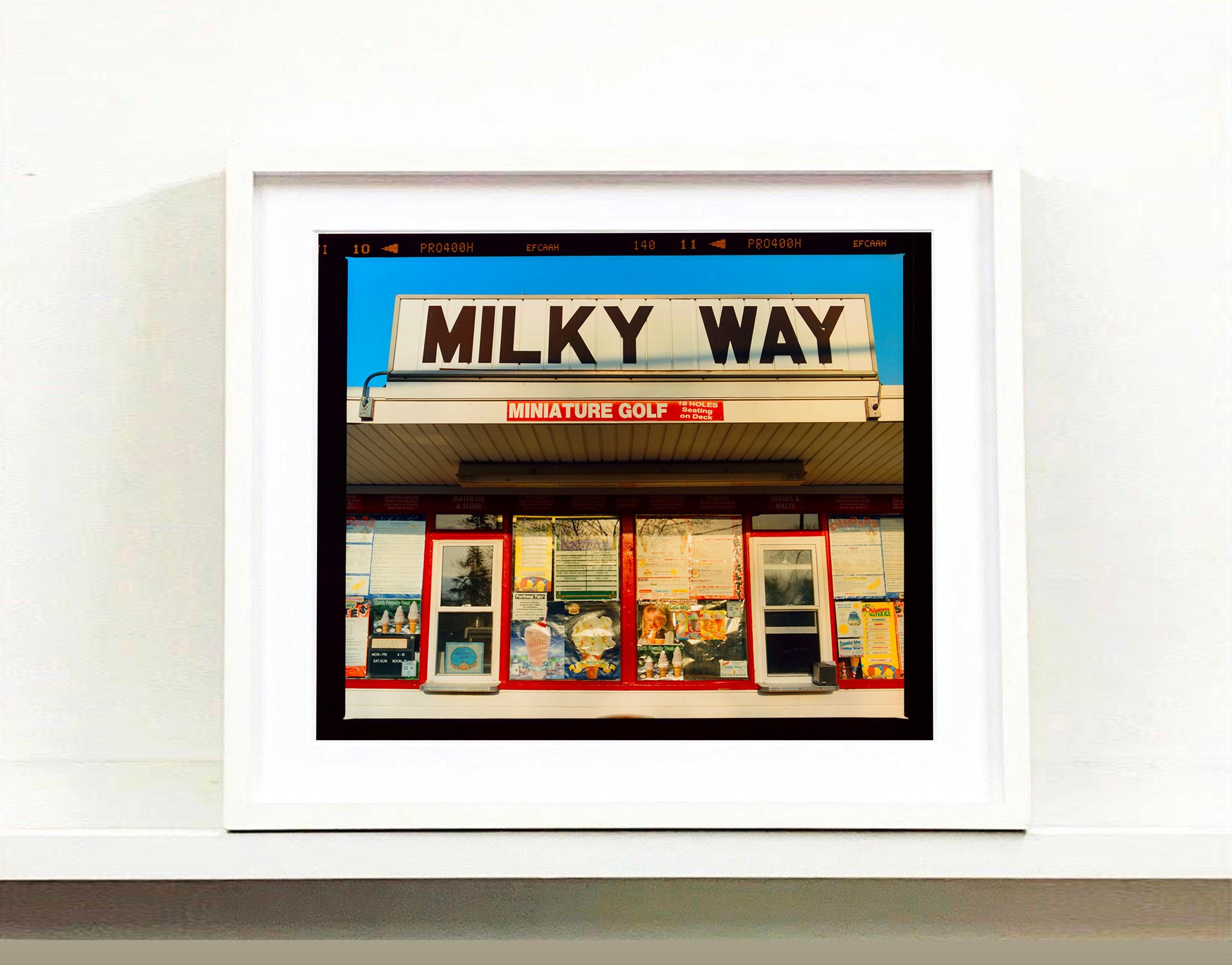 'Milky Way' on the road to Cape May from Richard Heeps Jersey Shore series. Taken in April 2013, this picture was first executed in Richard's darkroom in October 2020, he presents it full frame showing the film rebate. 
This roadside America
