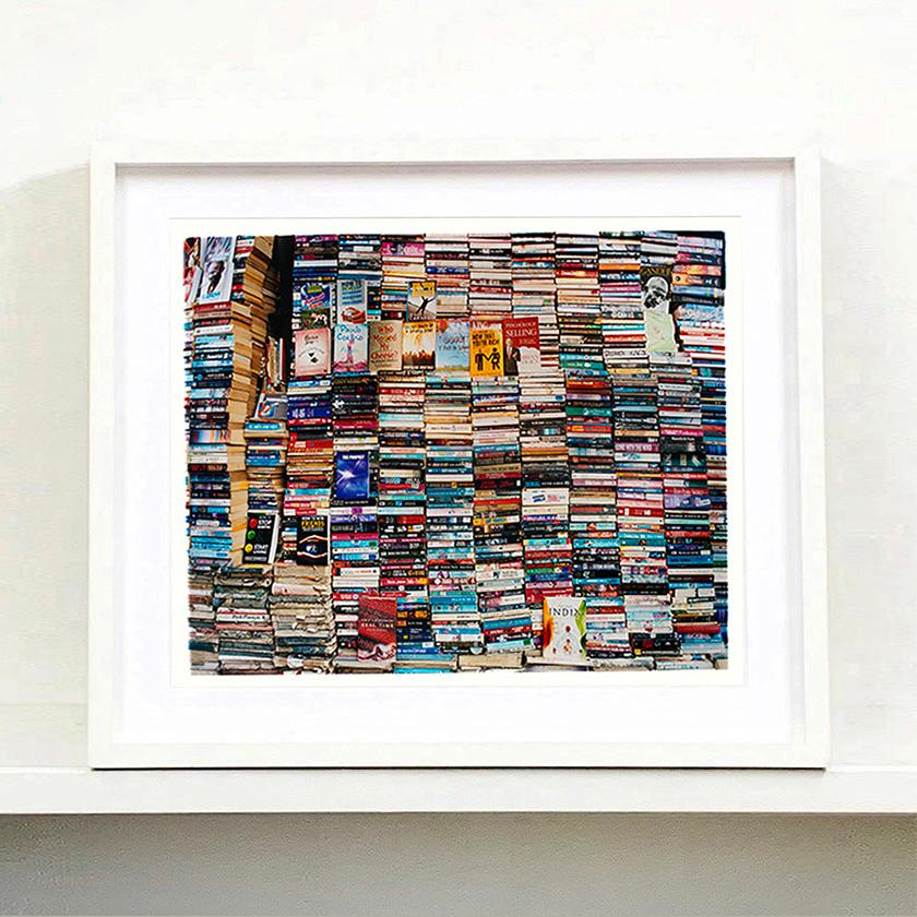 As books are beginning to disappear in physical form this picture is perfect for book lovers, it even gives you the sense of book hunting in a store. Photographed in Delhi in 2013 this piece perfectly represents the organised chaos of India. Part of
