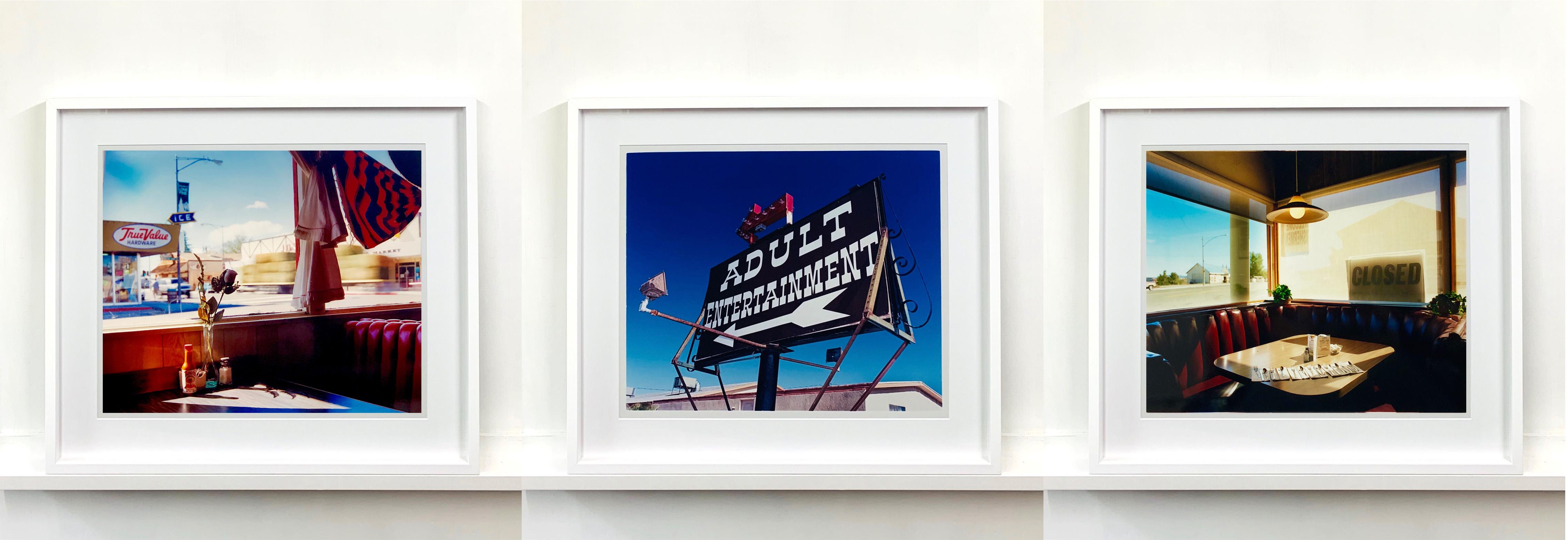 Part of Richard Heeps 'Dream in Colour' Series, 'Nicely's Café' has a vibe of an American road trip, the classic diner interior has a cool cinematic feel.

This artwork is a limited edition of 25, gloss photographic print, dry-mounted to aluminium,
