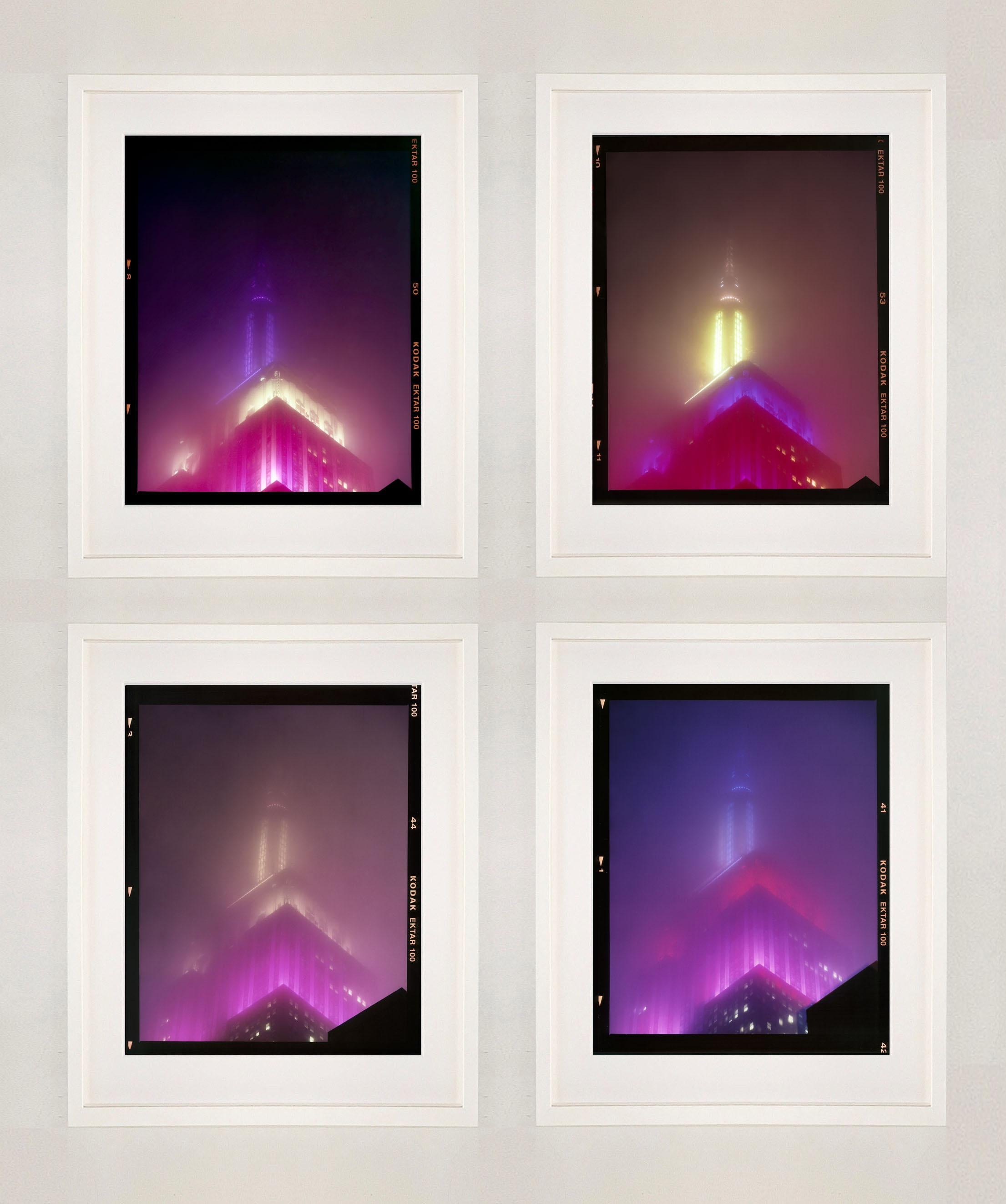 'NOMAD VII (Film Rebate)', New York. Richard Heeps has photographed the iconic Empire State building in the mist. The NOMAD sequence of photographs capture the art deco architecture illuminated by changing colours, and is part of Richard's street