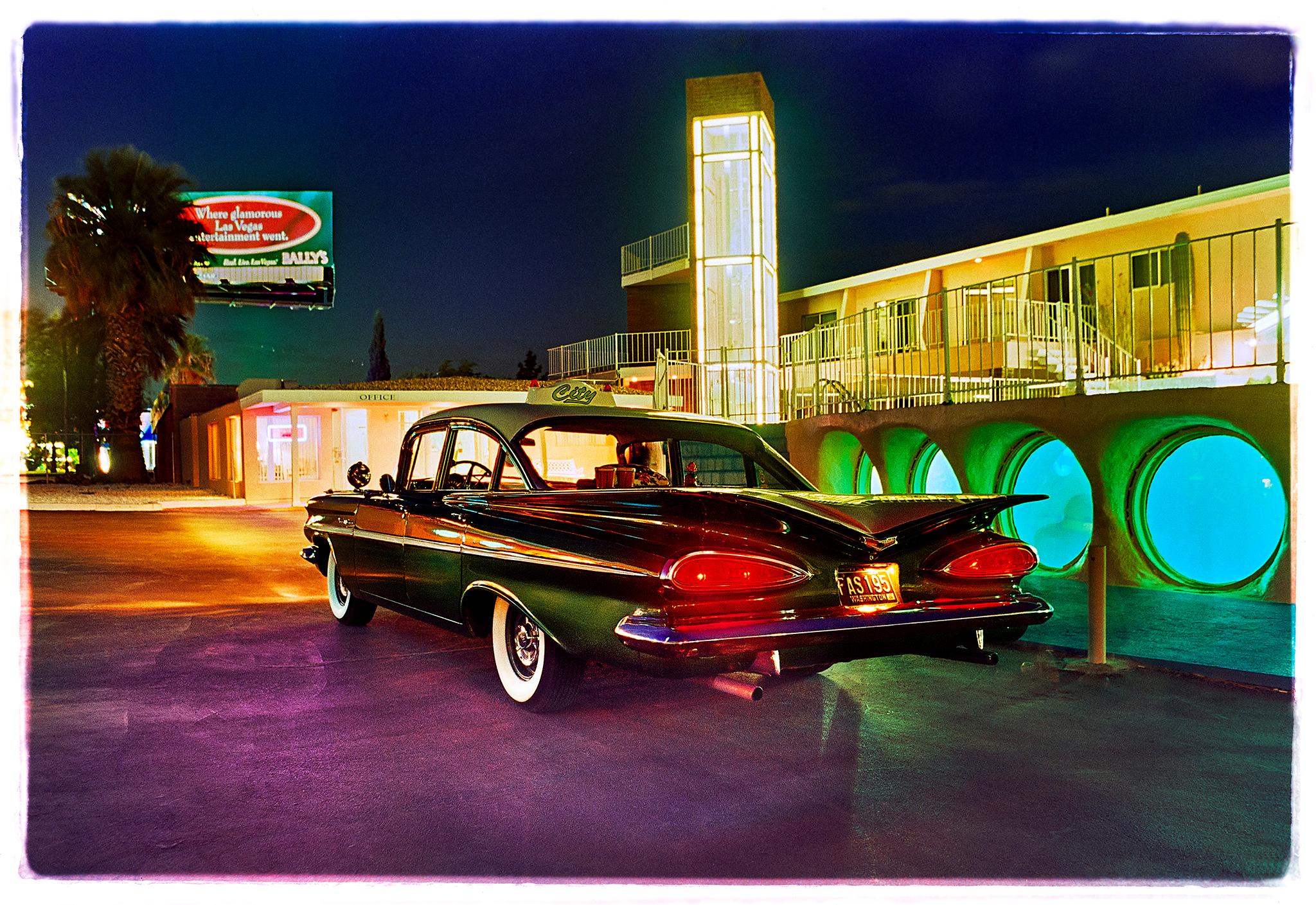 Capturing the cinematic Glass Pool Motel which is sadly no longer there, and an iconic Chevy Bel Air, it is a perfect example of a Lost Vegas. This is one of Richard Heeps' classic Americana photographs, from his 'Dream in Colour' Series which