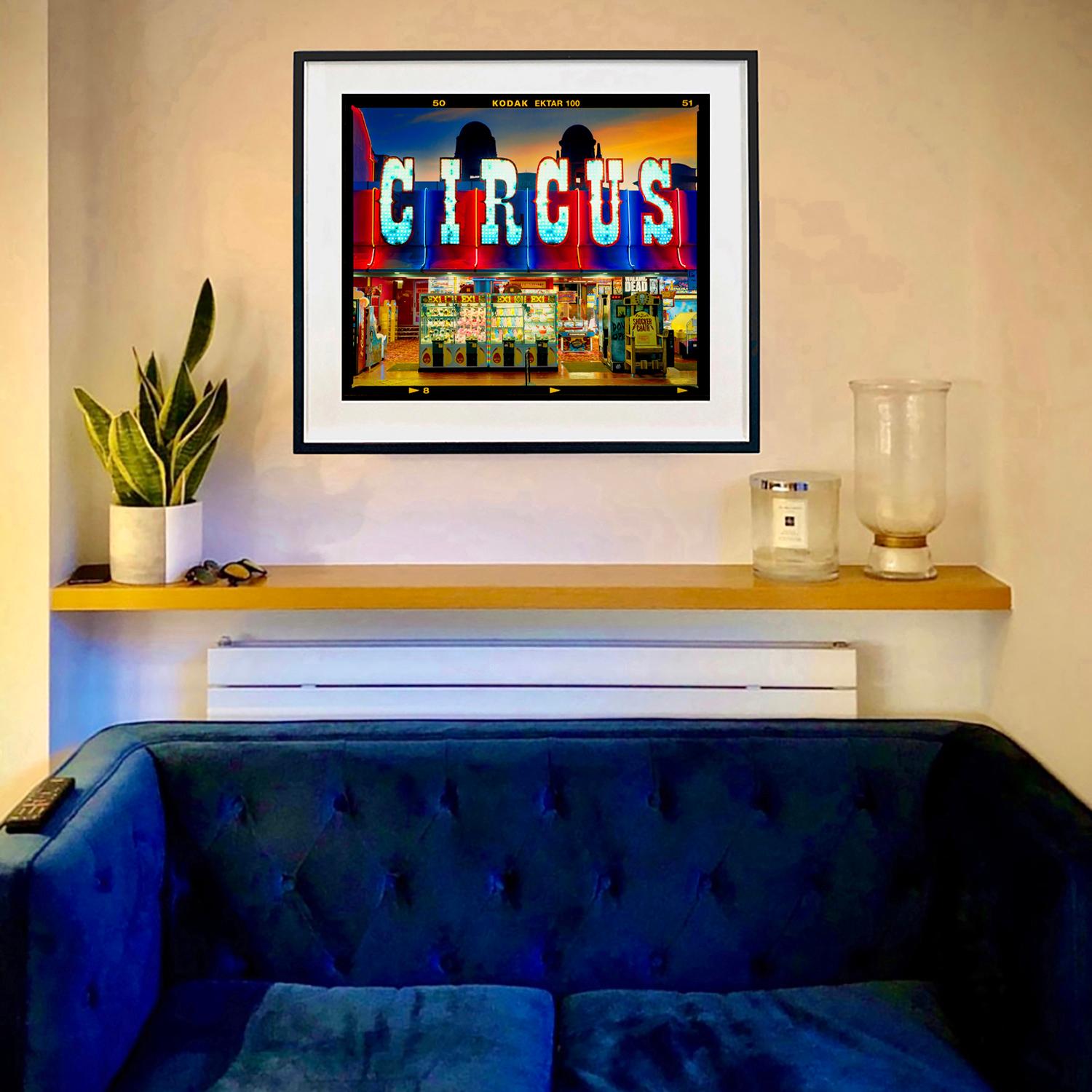 Prize Shop Circus, Norfolk - Typografie Farbfotografie (Schwarz), Landscape Photograph, von Richard Heeps