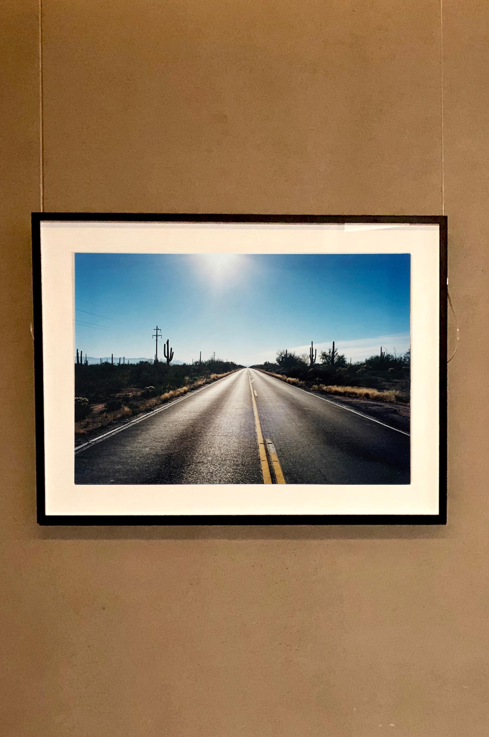 Part of Richard Heeps 'Dream in Colour' Series, this is the classic American open road photograph, which is a metaphor throughout Richard's work. The early morning sunlight and the road combine to create this iconic piece.

This artwork is a limited
