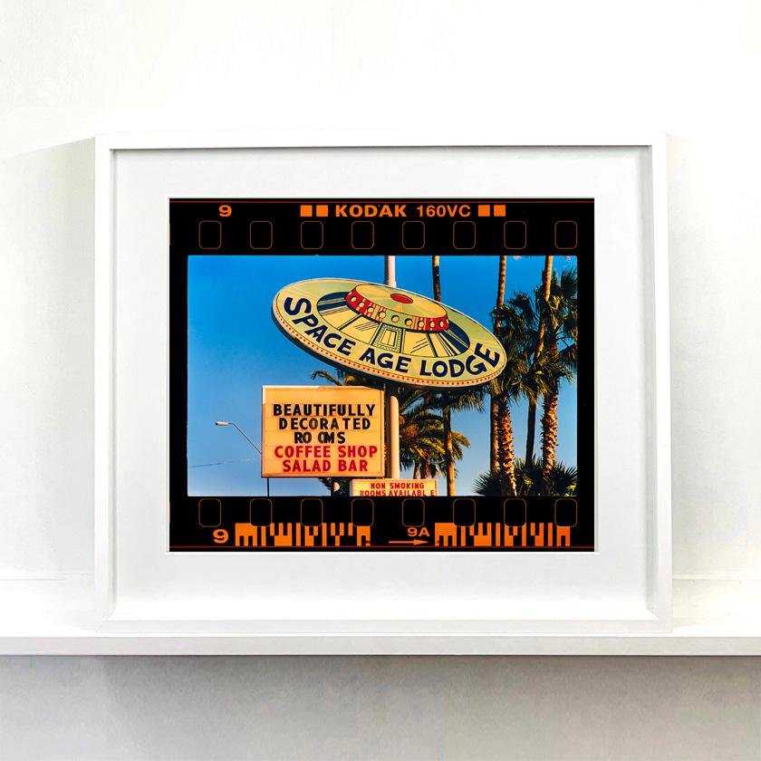 On the Road, reimagines classic Richard Heeps artworks presented with full film rebate almost like a blown up contact sheet. This Googie sign photograph captures the iconic and memorable Space Age Lodge, in Gila Bend, Arizona. 

This artwork is a