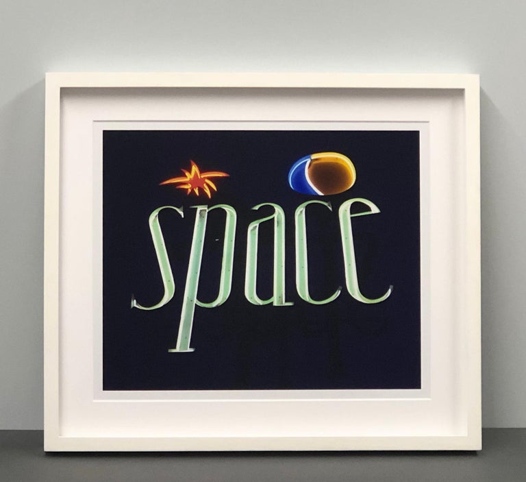 Space, Ibiza, the Balearic Islands Framed - Contemporary Color Sign Photography - Black Print by Richard Heeps