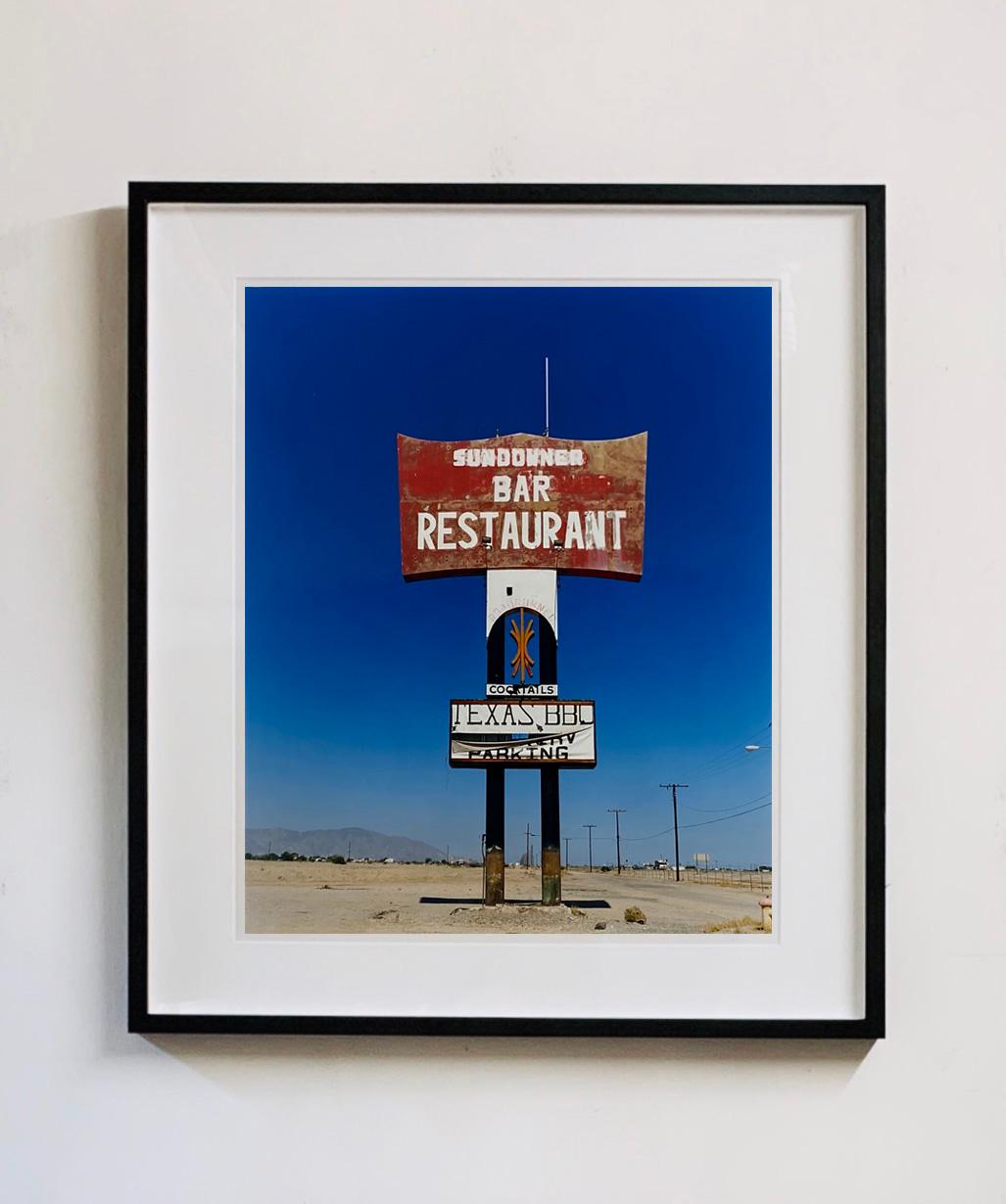 Sundowner II, Salton Sea, California - Blue sky roadside America color photo - Photograph by Richard Heeps
