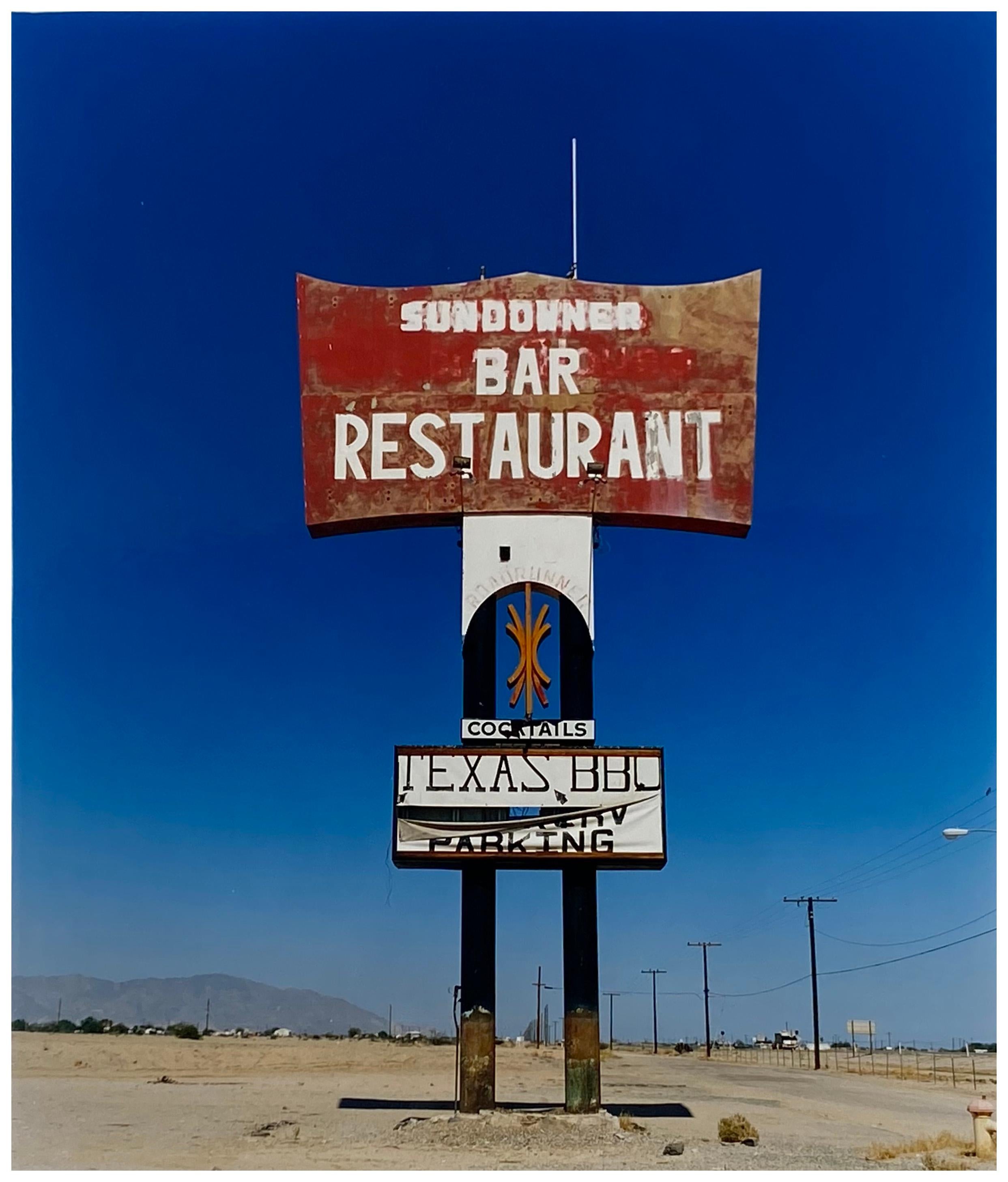 Richard Heeps Color Photograph - Sundowner II, Salton Sea, California - Blue sky roadside America color photo