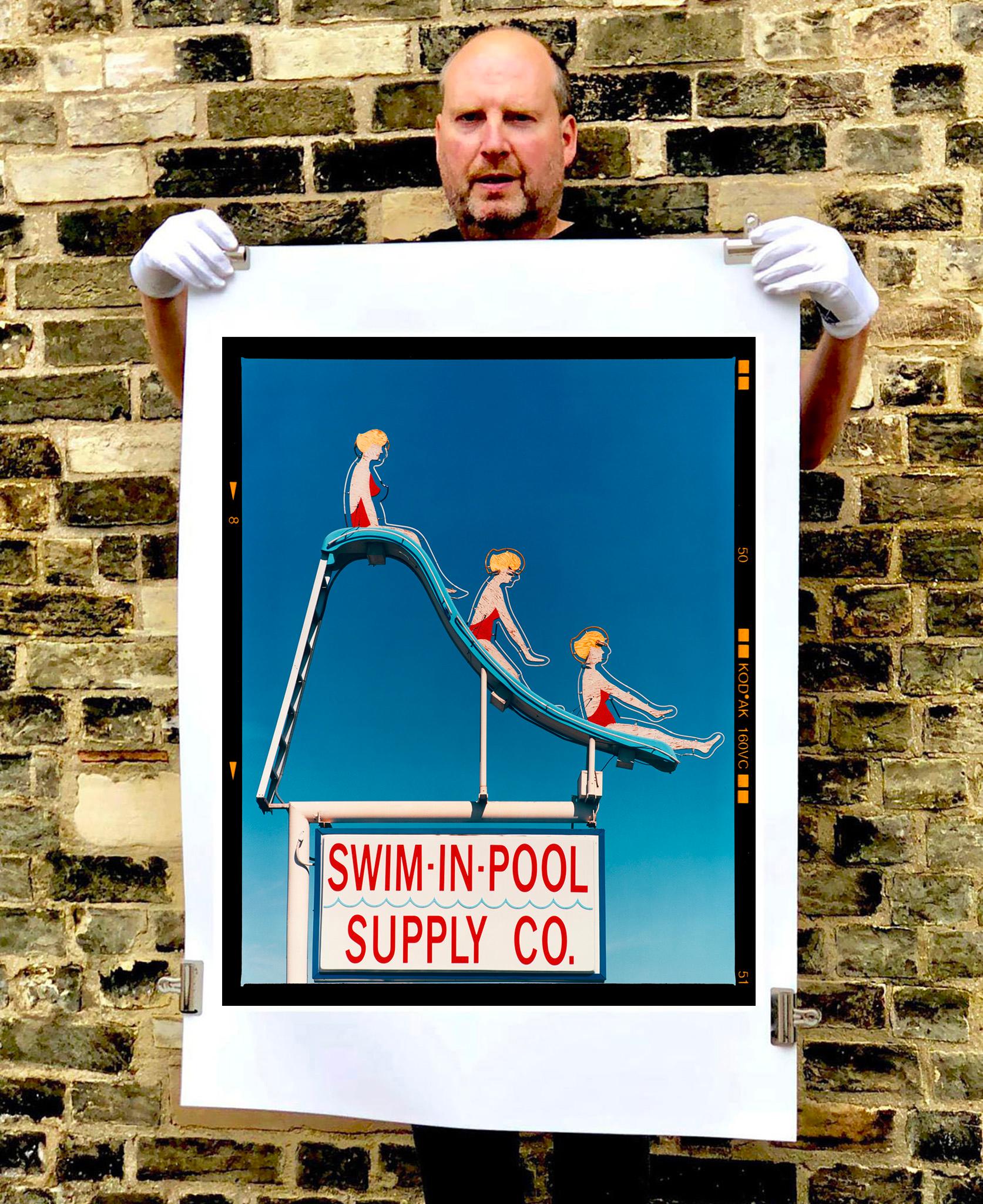 Swim-in-Pool Supply Co. This fun original artwork really shows Richard's unique eye as a photographer. Captured in Las Vegas in 2003 it is part of a series he took over a few years. The popping colours of blue, red and yellow have a bold painterly