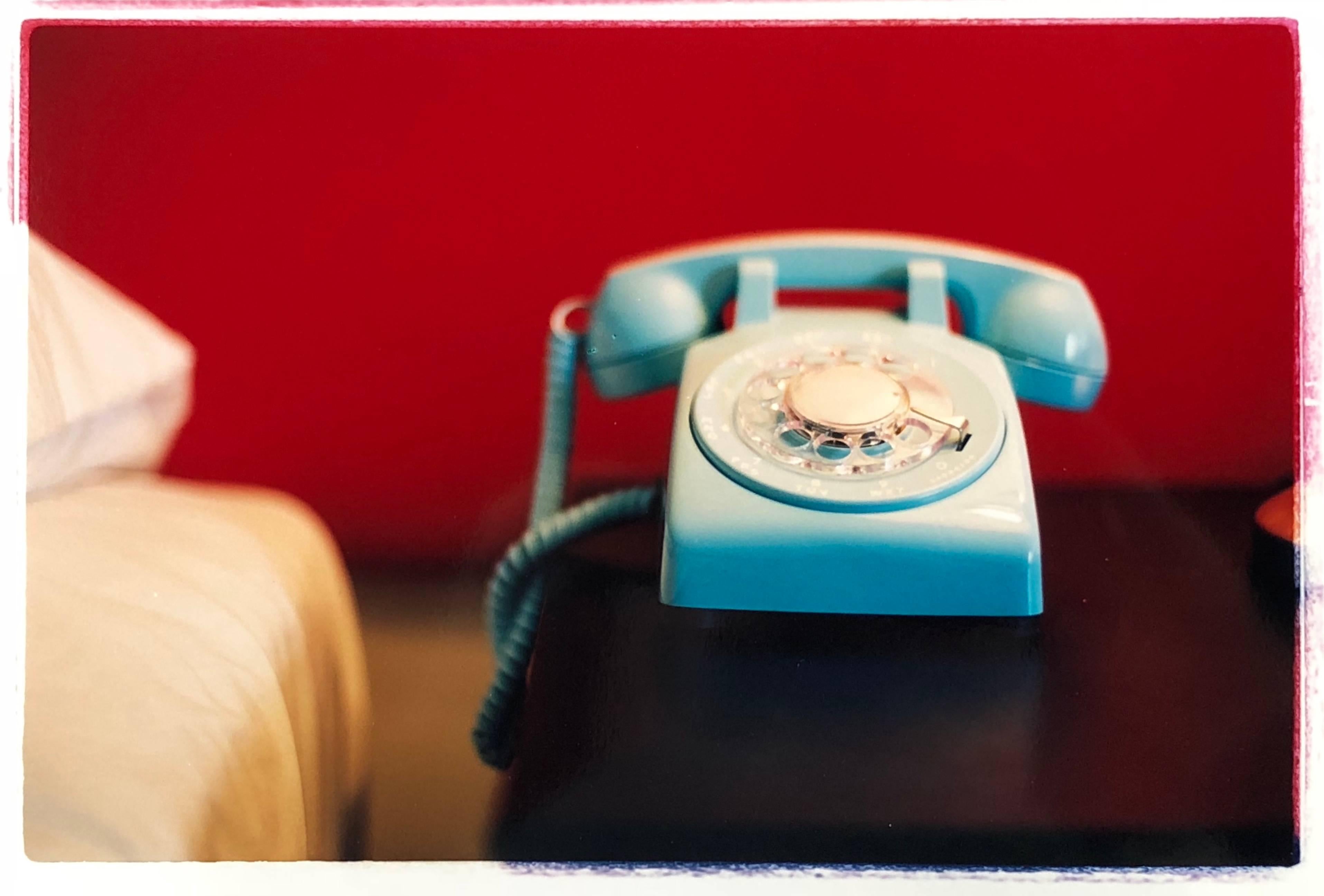 'Telephone I' part of Richard Heeps 'Dream in Colour' Series. 
This cool Palm Springs interior photography combines gorgeous colours of bold red and dreamy blue and it has a mid-century modern nostalgic vibe.

This artwork is a limited edition of