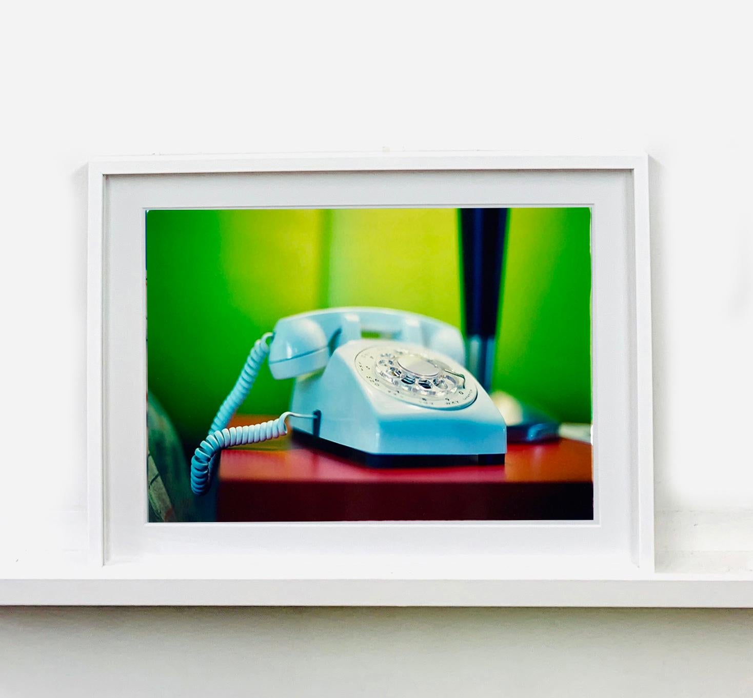 'Telephone VII' part of Richard Heeps 'Dream in Colour' Series. 
This cool Palm Springs interior photography featuring a vintage telephone on a nightstand combines  bright contrasting green, red and blue color tones and dreamy nostalgic mid-century