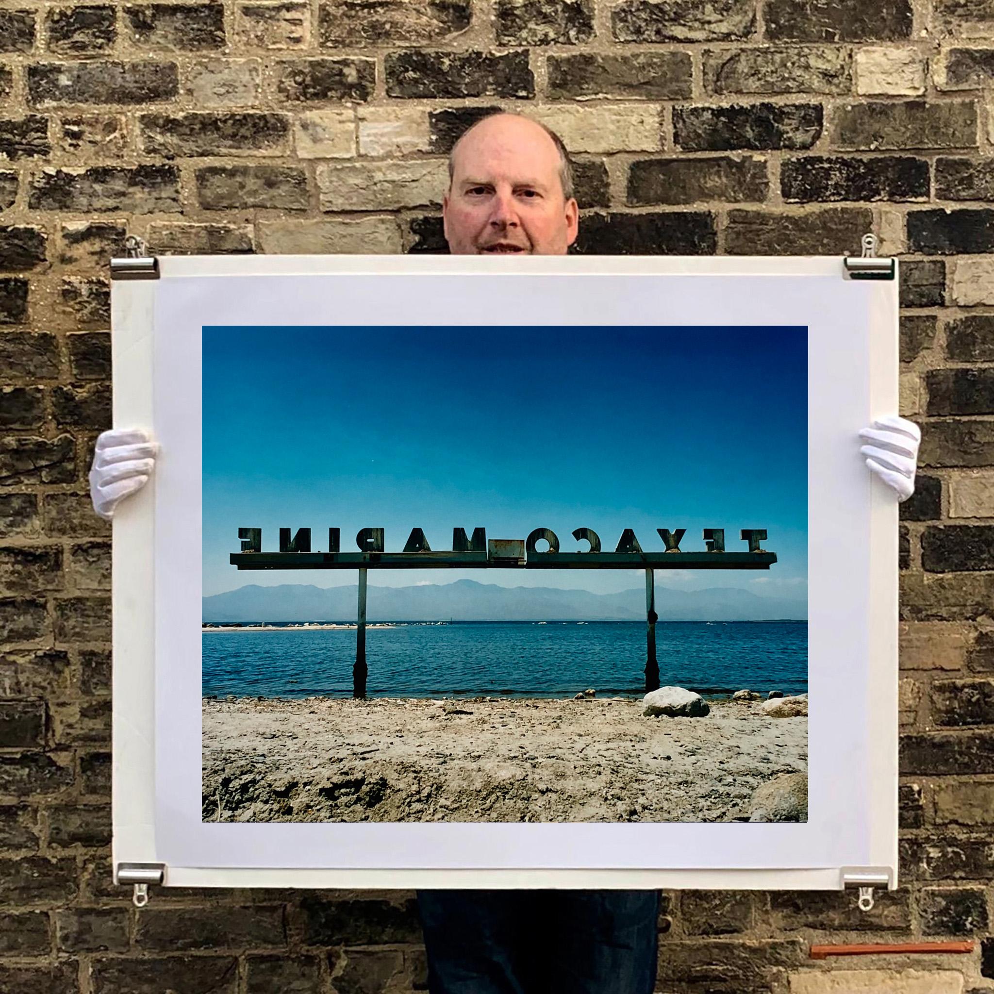 Texaco Marine, photograph from Richard Heeps 'Salton Sea' Collection. 
This large advertising sign on the bank of California's largest marina, once a popular celebrity mooring point. The sign is no longer there so Richard has captured the iconic