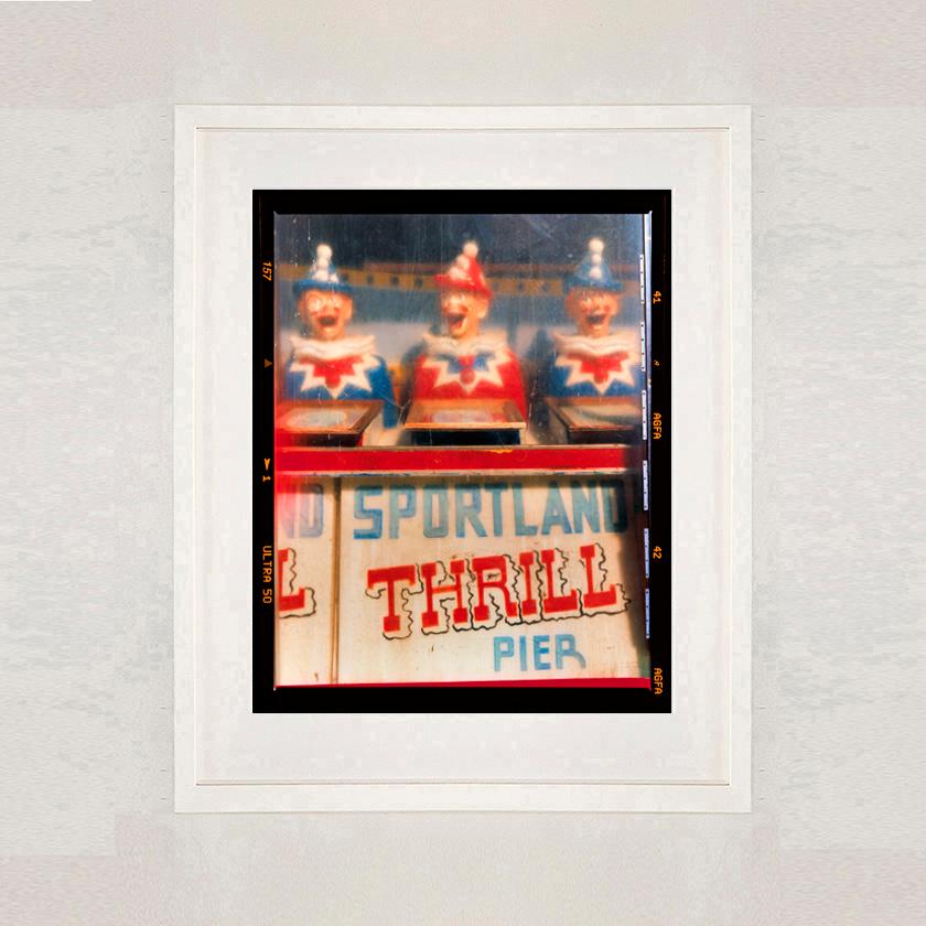 Thrill Pier, Wildwood, New Jersey - Seaside Amusements Clowns Photograph - Contemporary Print by Richard Heeps