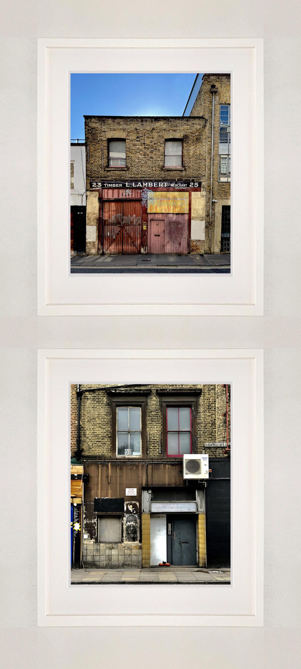 'Timber Merchant', East London street photography from Richard Heeps' series A Short History of London.

This artwork is a limited edition of 25 gloss photographic print, dry-mounted to aluminium, presented in a museum board white window mount and a