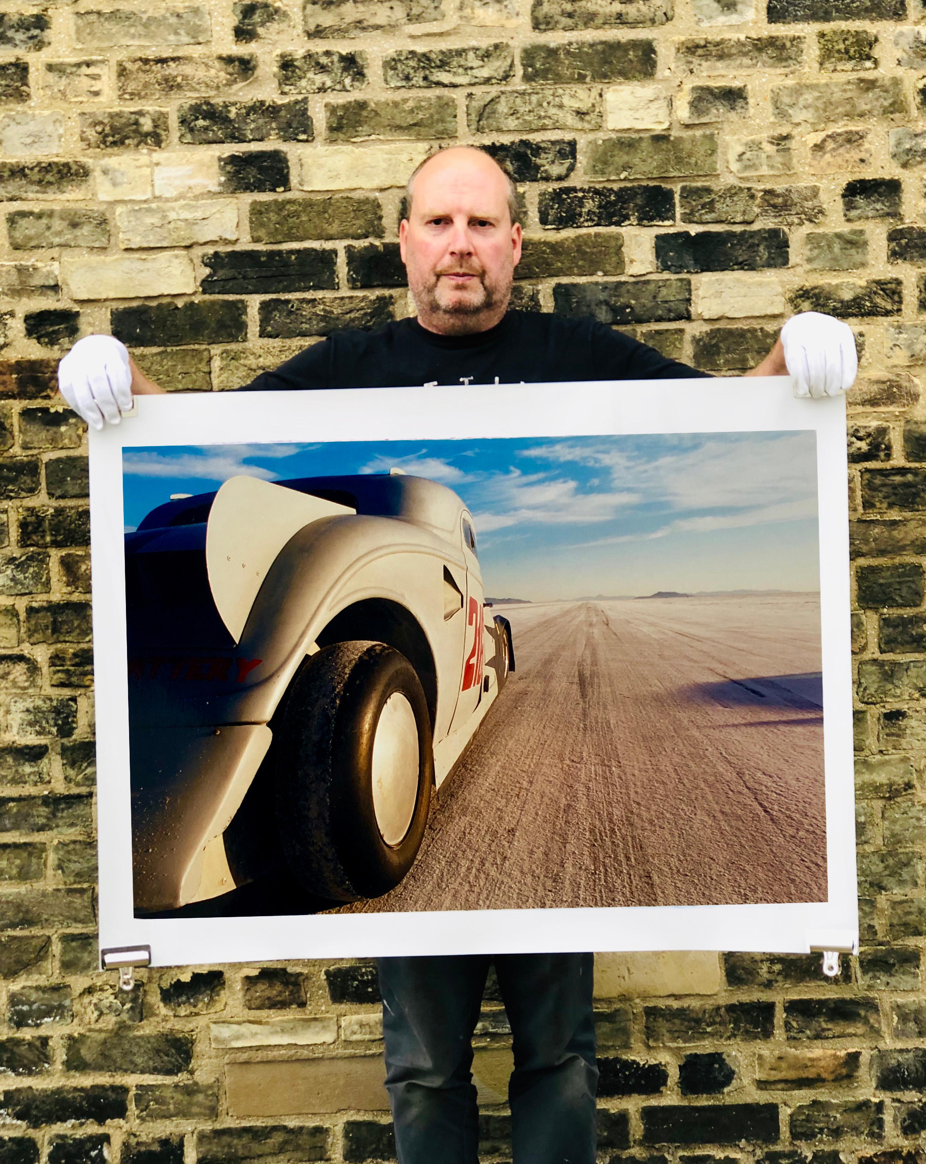 Captured in the iconic home of speed, Bonneville Salt Flats, the powerful iconic Ford Coupe Land Speed Racing Car sits in the foreground of the powerful expansive landscape.

This artwork is a limited edition of 25, gloss photographic print.