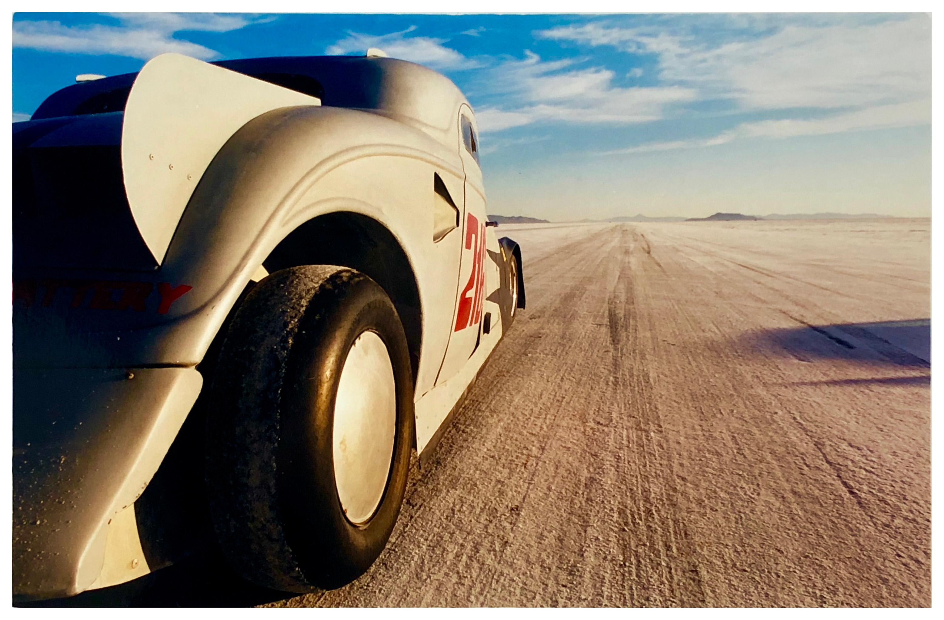 Tom Thumb Special, captured in the iconic home of speed, Bonneville Salt Flats. The powerful, this iconic Ford Coupe Land Speed Racing Car, sits in the foreground of the powerful expansive landscape.

This artwork is a limited edition of 25, gloss