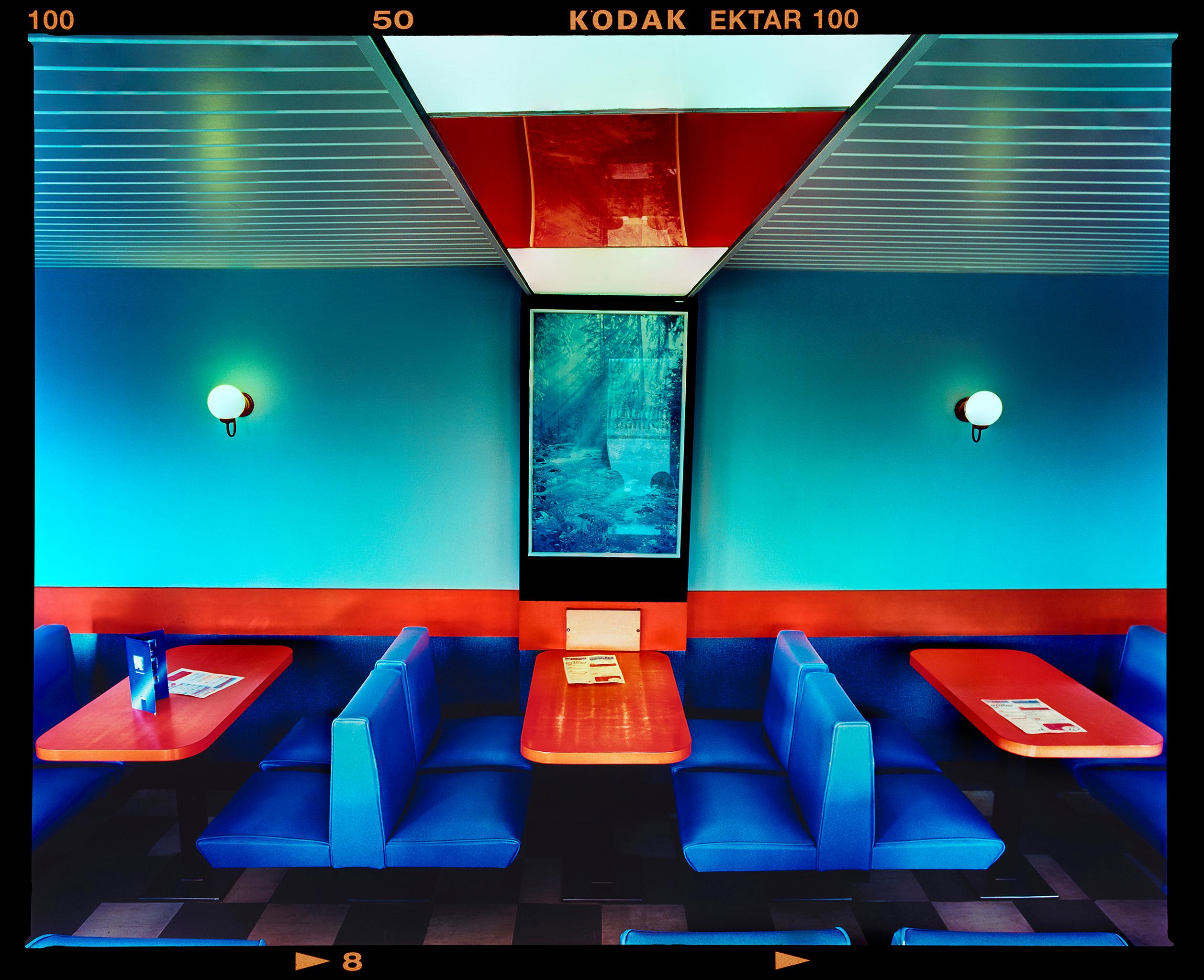 Vintage Wimpy, interior photograph by Richard Heeps. The timeless combination of blue seating and red tables will bring back memories of the original fast food diner.

This artwork is a limited edition of 25, gloss photographic print only. It will