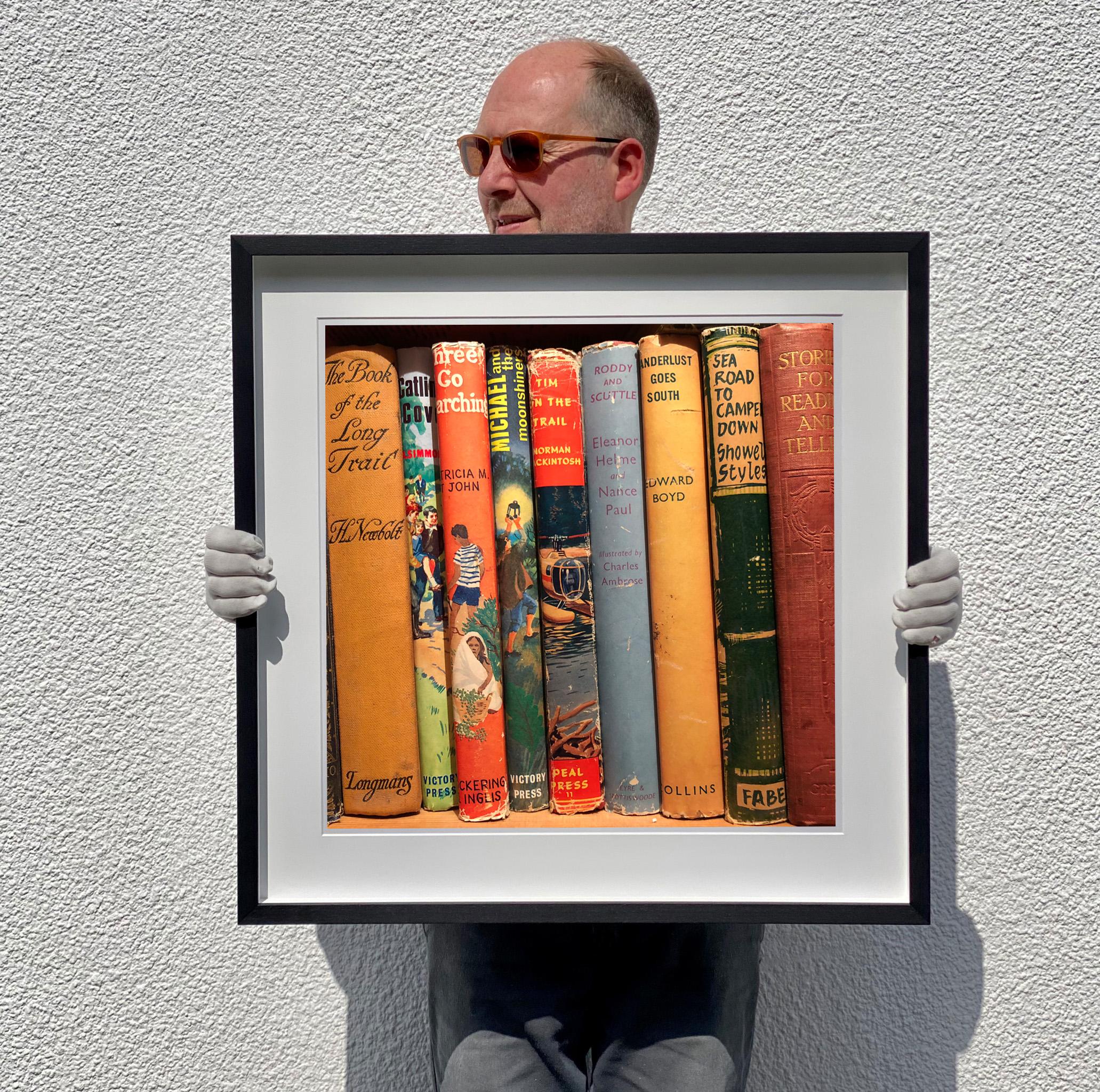Wanderlust Goes South, Sheringham, Norfolk - Vintage Book Spines Photo - Contemporary Photograph by Richard Heeps