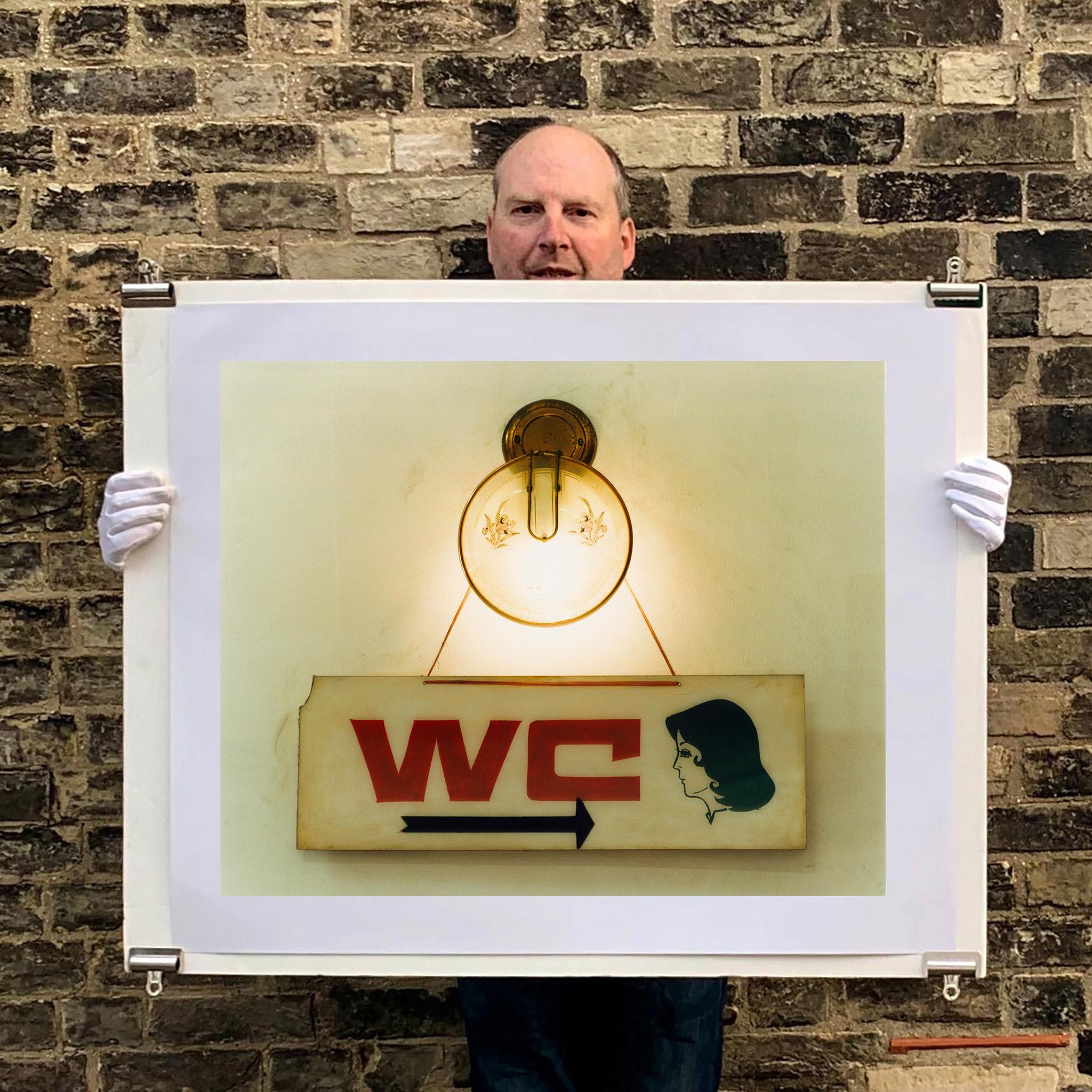 WC, a kitsch vintage sign captured in Ho Chi Minh City, Vietnam. This artwork has a beautiful balance of neutral colour tones, texture and typography.

The artwork is a limited edition of 25 gloss photographic print from negative, accompanied by a