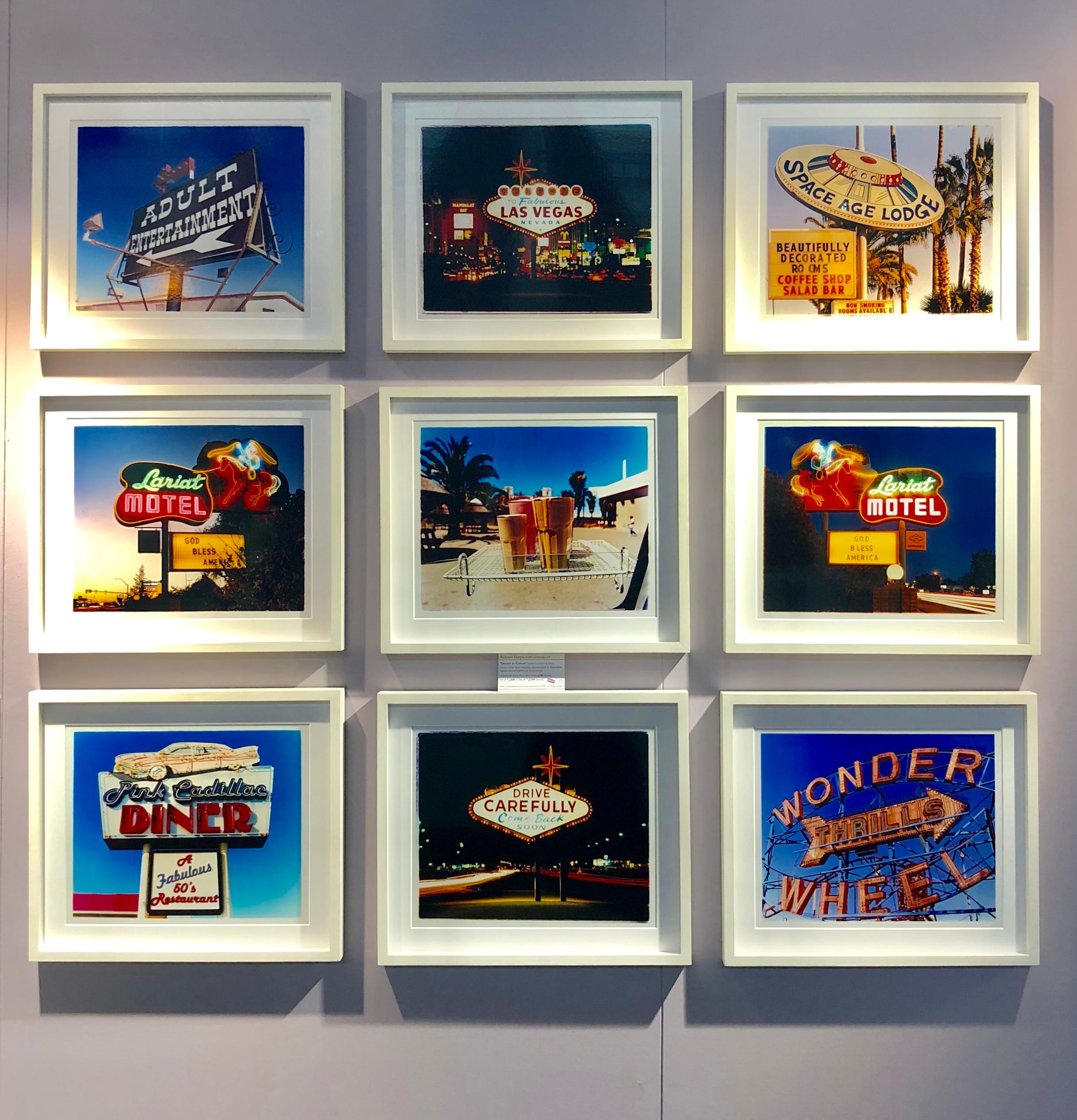 Part of Richard Heeps 'Dream in Colour' Series, this is one of his classic American signs. The iconic Las Vegas sign is captured here at night with such vibrancy.

This artwork is a limited edition of 25, gloss photographic print, dry-mounted to