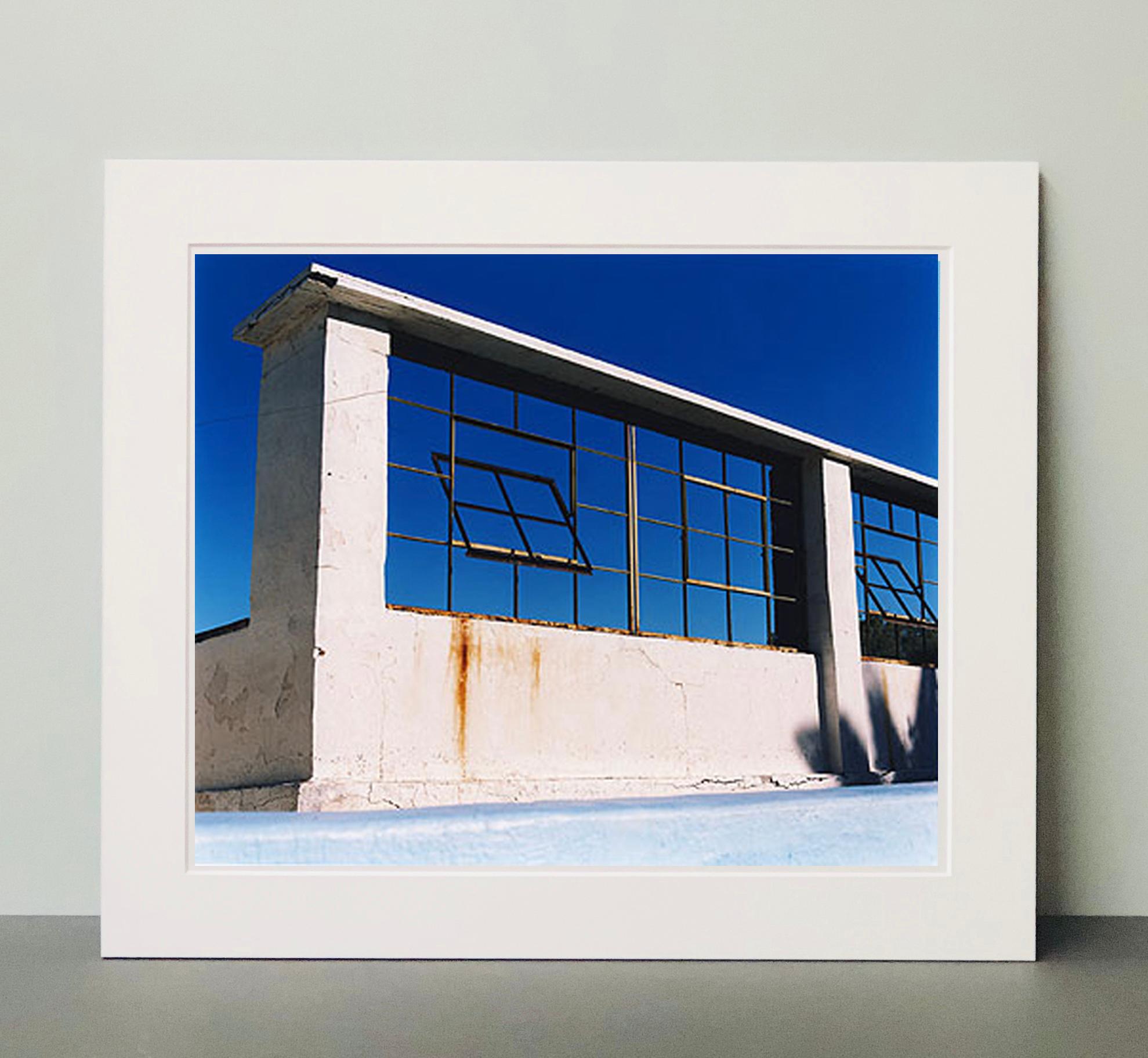 Window of the World, Zzyzx Resort Pool, Soda Dry Lake, California - Color Photo - Blue Color Photograph by Richard Heeps