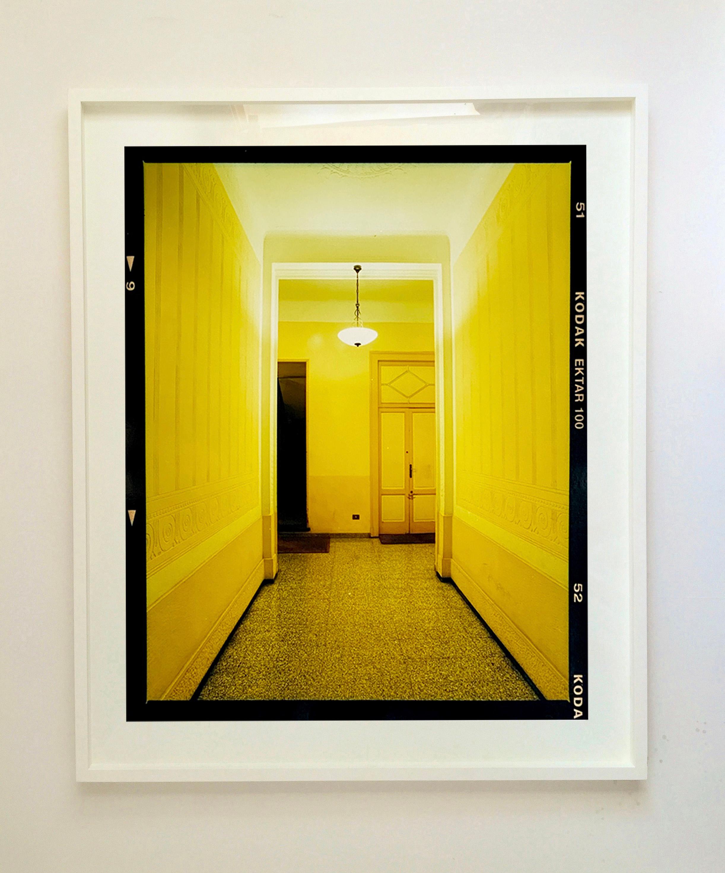 Yellow Corridor (Night), Milan - Italian architectural color photography - Photograph by Richard Heeps