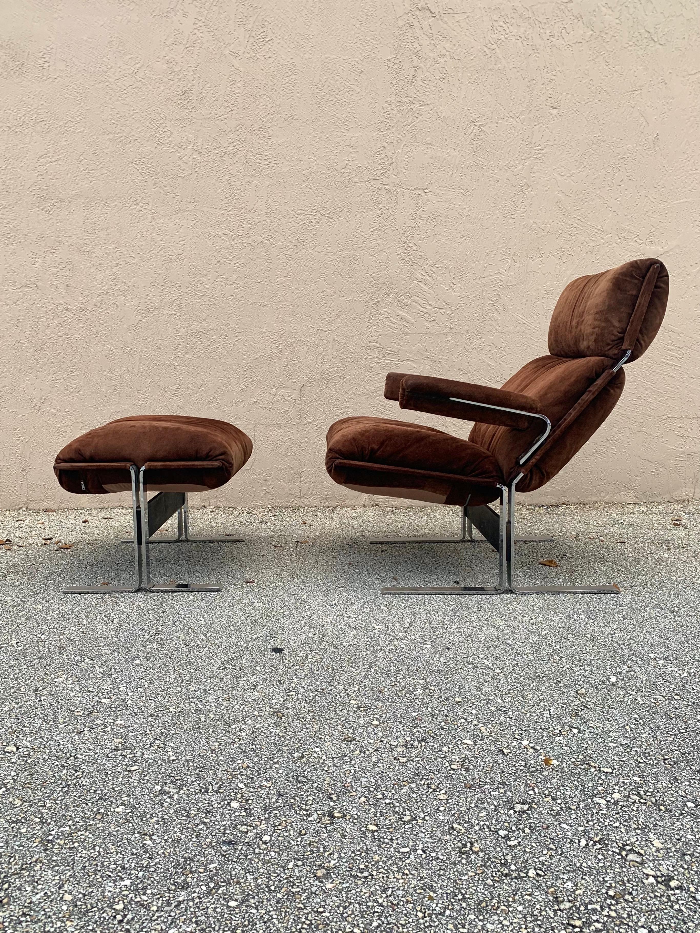 Mid-Century Modern lounge chair and ottoman designed by Richard Hersberger for Pace Furniture. Chairs are upholstered in their beautiful original brown suede leather. Frames are heavy and sturdy polished chrome with a stretcher. 

The chairs are