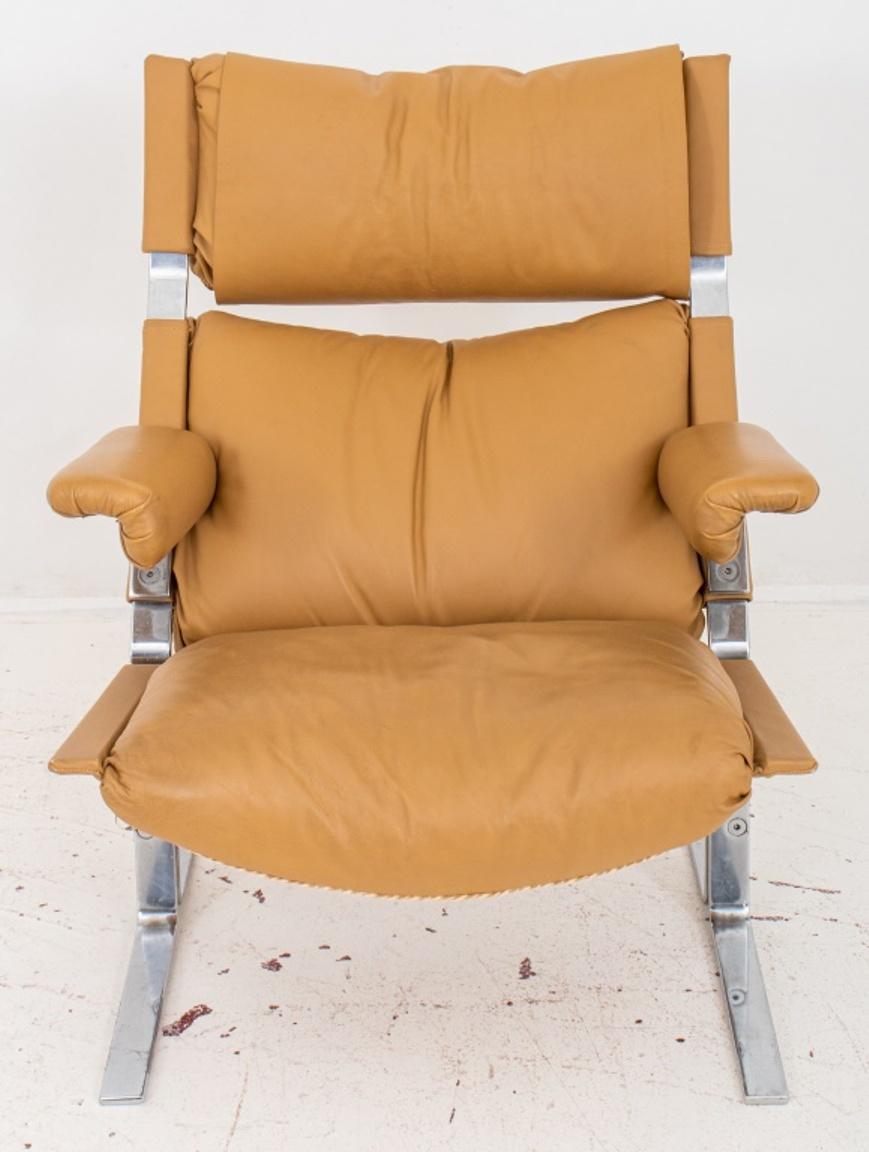 Mid-Century Modern Richard Hersberger (born 1931) for Pace Collection tan leather and steel lounge armchair and ottoman, circa late 1970s. Armchair: 36