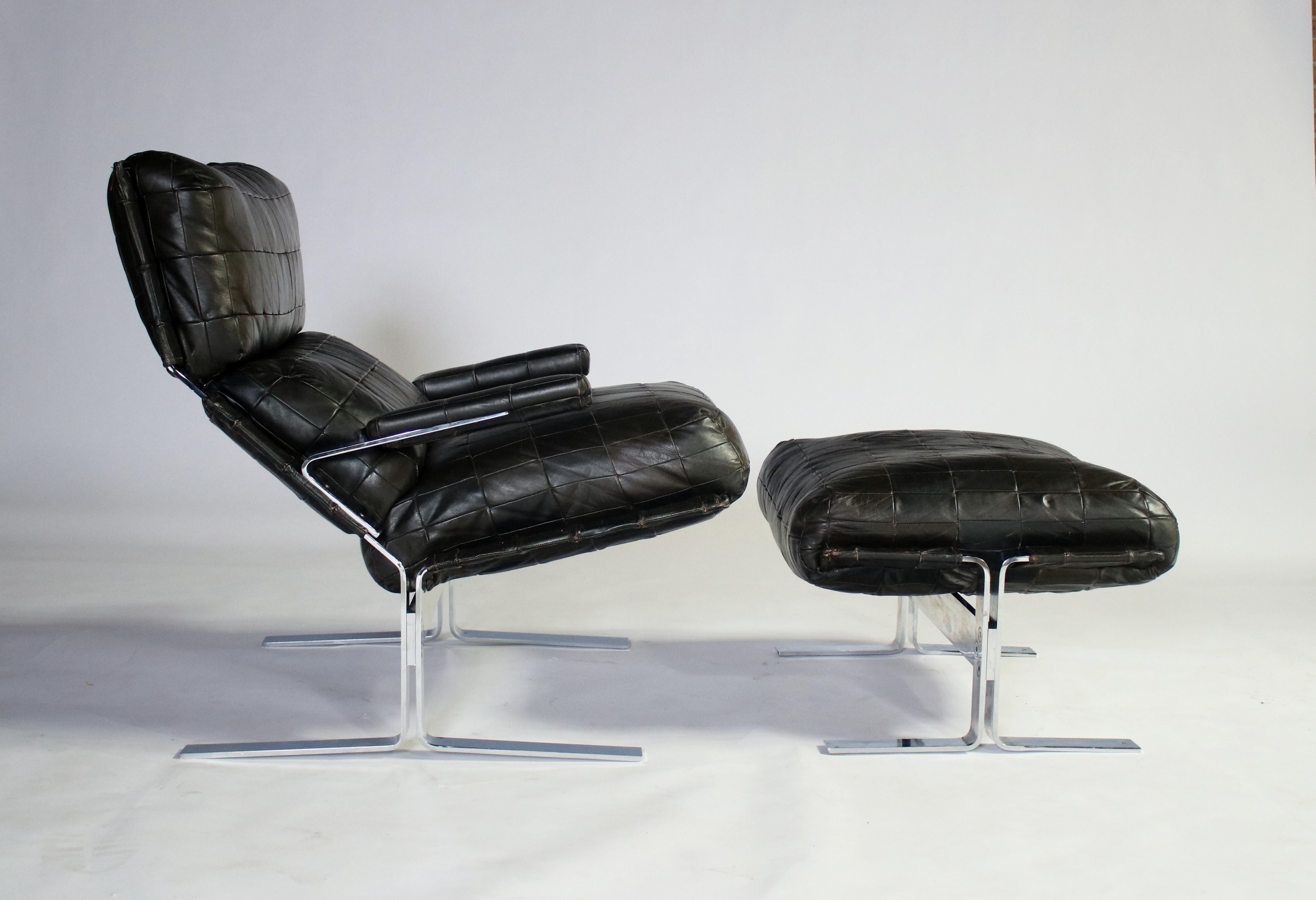 1970s patchwork leather upholstered cushions on polished steel lounge chair and ottoman by Richard Herberger for Saporiti. The steel and leather has been newly polished, and restored and the cushions have been reshaped with new stuffing, all showing