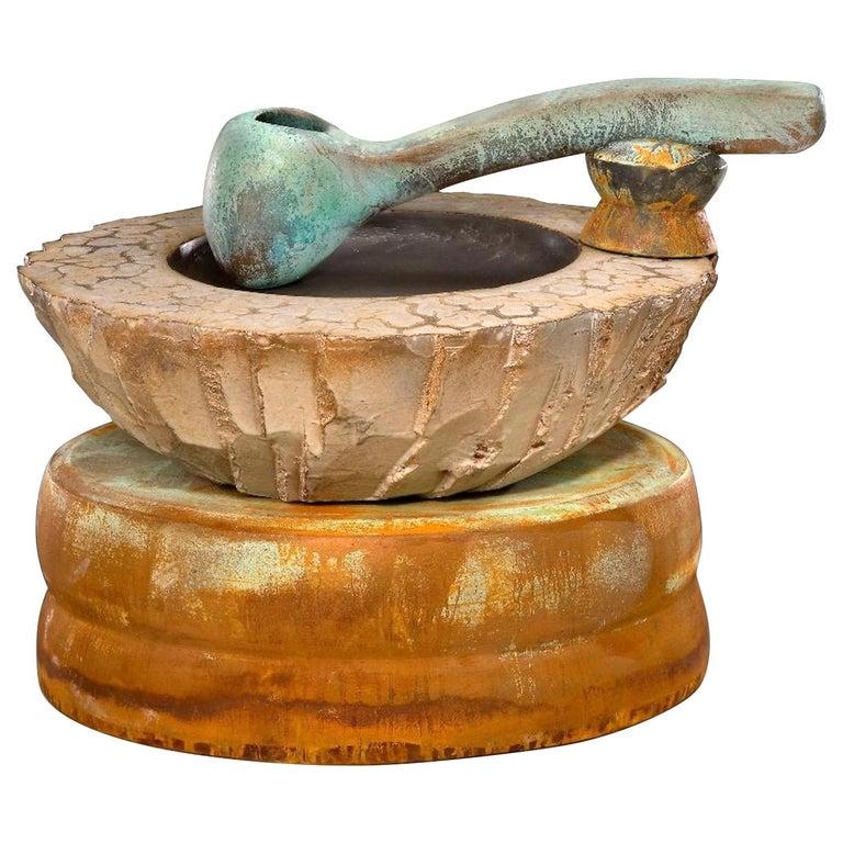 Contemporary American ceramic artist Richard Hirsch's Altar bowl with Ladle #3 was made in 2007. It's wheel thrown and hand built clay with low fire white glaze and raku patinas. In the book 