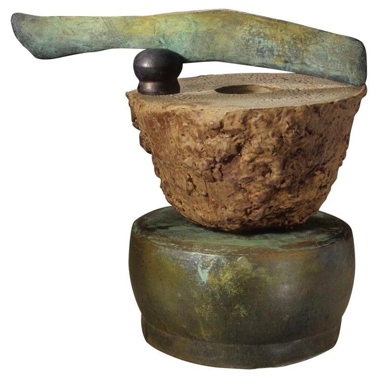 Contemporary American ceramic artist Richard Hirsch's Altar Bowl with Weapon Sculpture was assembled in 2000. It's wheel thrown and hand built clay, red and yellow low fired glazes with raku patinas. Two separate pieces of high fired stoneware are