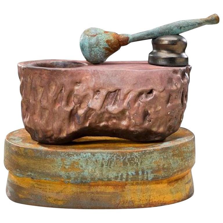Contemporary American ceramic artist Richard Hirsch's Mortar and Pestle Sculpture #30 was assembled in 2009. It's wheel thrown and hand built clay, slips and glazes with raku patinas. The following is an excerpt from the book 