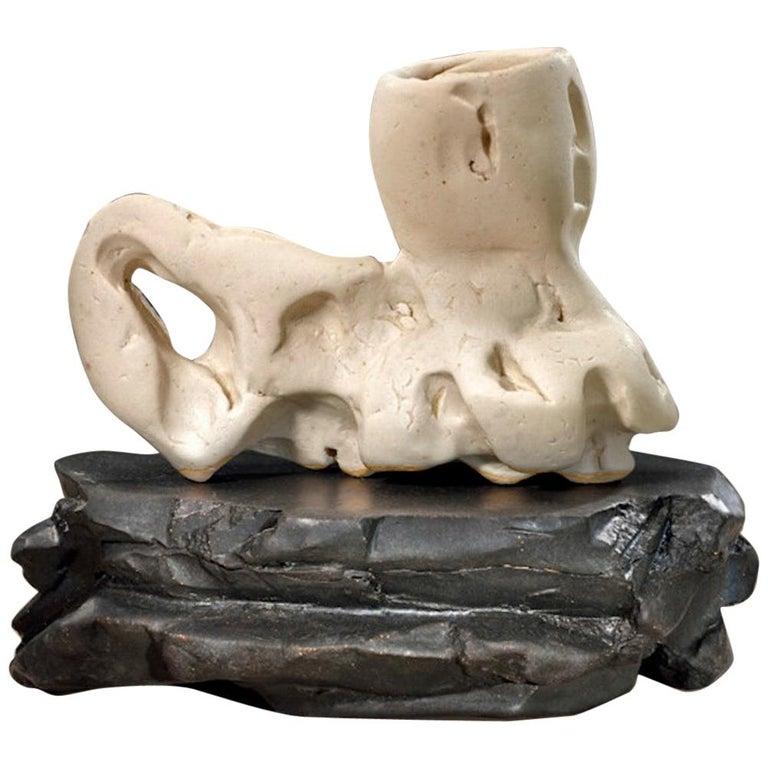 Contemporary American ceramic artist Richard Hirsch's Scholar Rock Cup Sculpture with stand #25 was made in 2018. It's wheel thrown and hand built clay with white and black glaze. Hirsch creates ceramic sculptures that explore the spirituality and