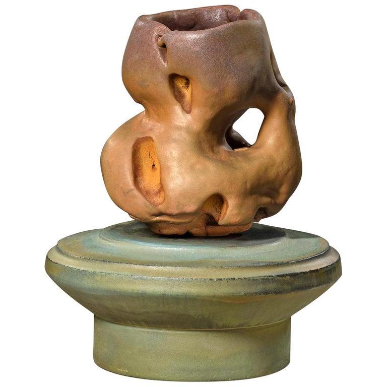 Contemporary American ceramic artist Richard Hirsch's Scholar Rock Cup Sculpture #43 was assembled in 2017. It's wheel thrown and hand built clay with red terra sigillata, green glaze, polychrome enamel paint and raku rust patinas. Hirsch creates