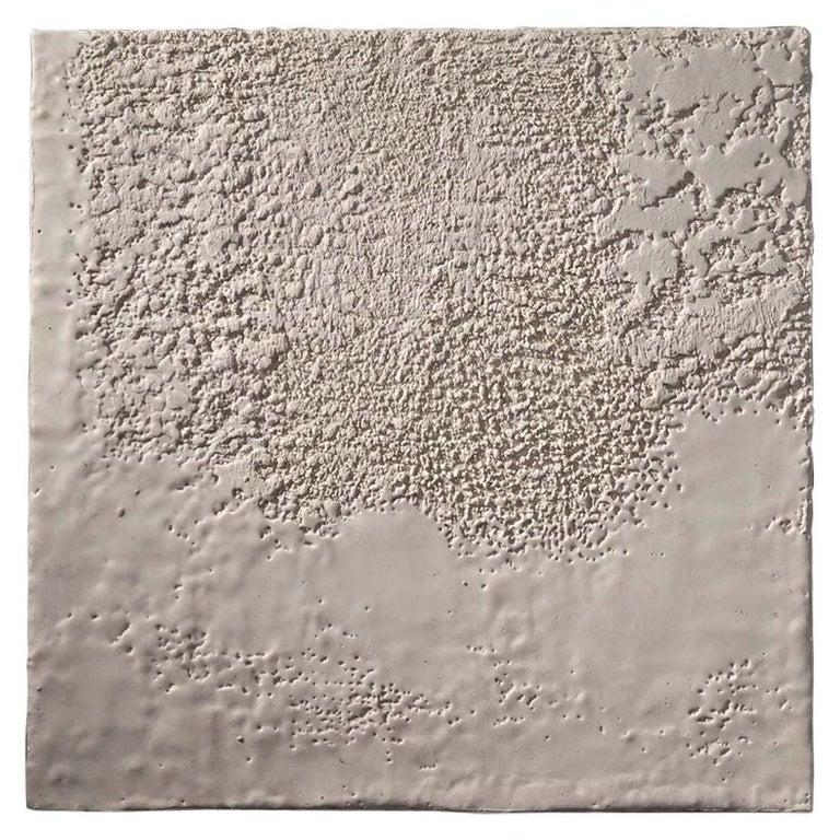 Contemporary American ceramic artist Richard Hirsch's encaustic Painting of Nothing #14M is made of ceramic raw materials, dry pigment and wax. This piece is part of his ongoing Painting of Nothing Series. Hirsch applies the waxy mix with a brush