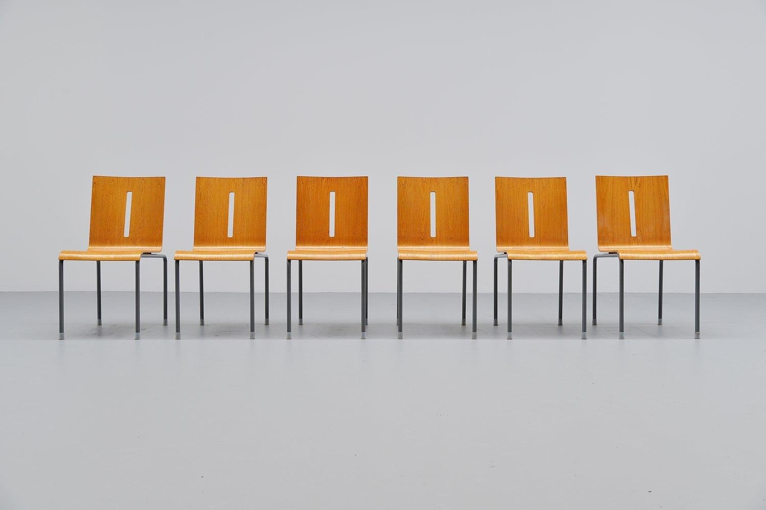 Very nice set of 6 Hopper chairs designed by one of the most important Dutch designers of the 21st century, Richard Hutten. These chairs were made in his own atelier in very small production numbers. The chairs have a grey lacquered tubular metal