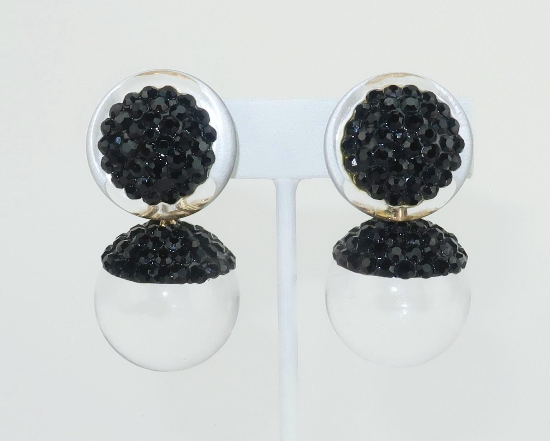 Elegant 1980’s Richard Kerr clip-on dangle earrings designed with black pave crystals (a Kerr calling card) and orb shaped acrylic drops.  Richard Kerr’s creations are often disco ready looks with loads of pave crystal bling but these are a little