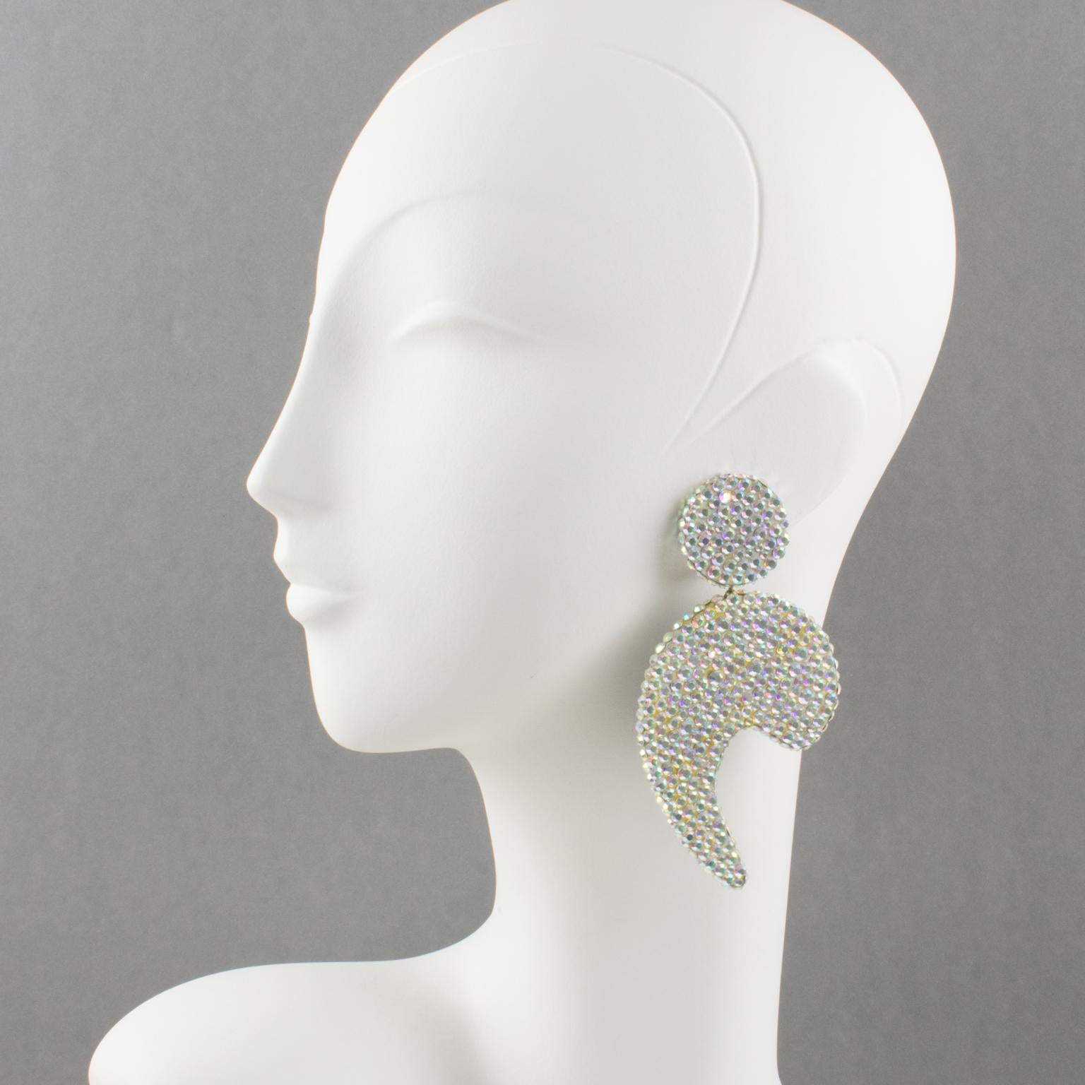 Incredible statement clip-on earrings designed by Richard Kerr in the 1980s. They are made up of his signature pave rhinestones. Featuring oversized dangling 