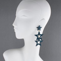 Richard Kerr Petroleum Blue Jeweled Dangling Star Clip Earrings