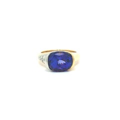 Richard Krementz 18k Gold & Platinum Oval Tanzanite w/ Diamond Channel Ring