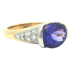 Richard Krementz 18k Gold & Platinum Oval Tanzanite w/ Diamond Channel Ring